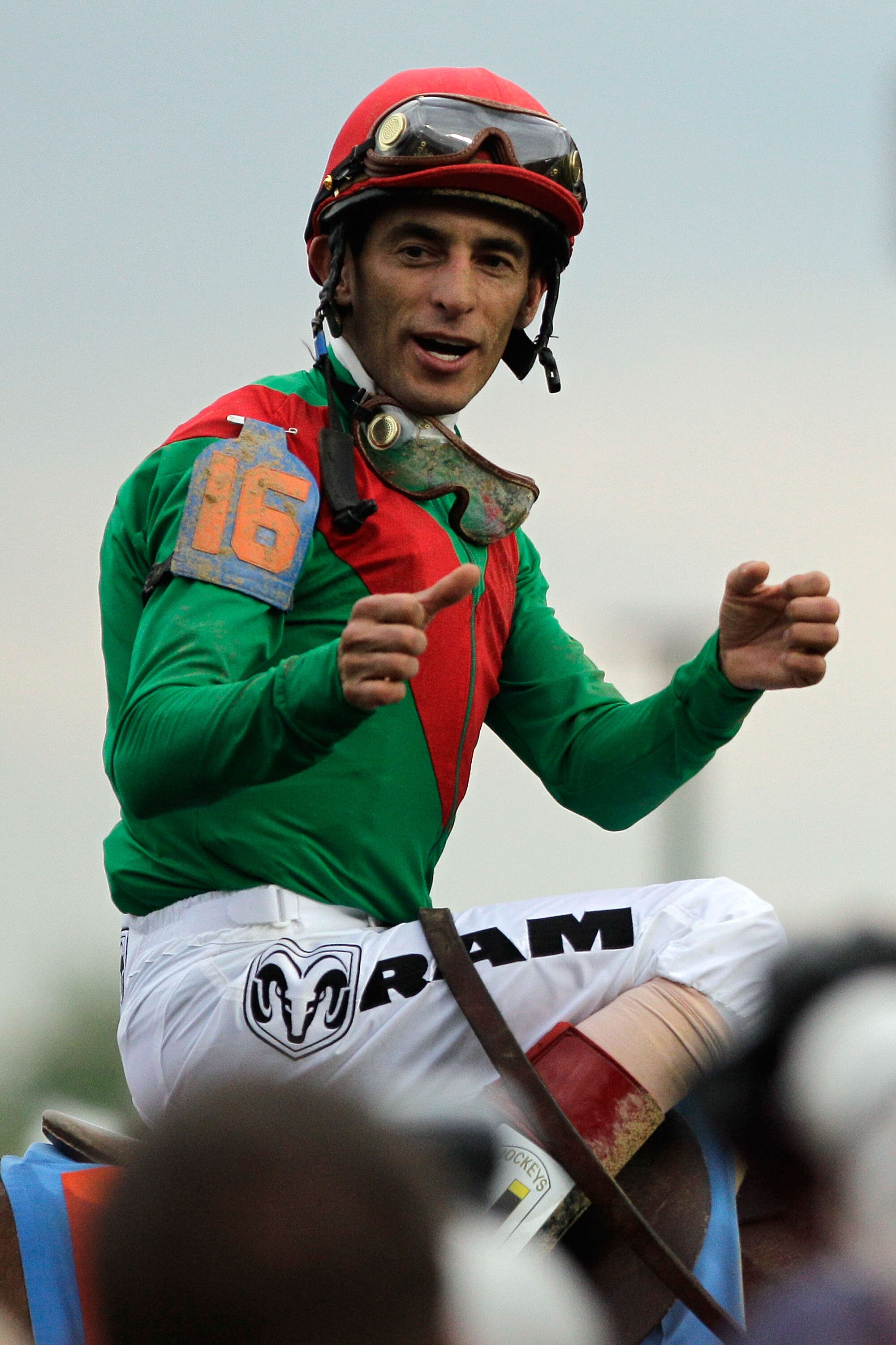 LOUISVILLE, KY - MAY 07:  Jockey John Velazquez, riding Animal Kingdom #16, celebrates winning the 137th Kentucky Derby at Churchill Downs on May 7, 2011 in Louisville, Kentucky.  (Photo by Rob Carr/Getty Images)