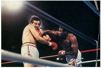 Gerry Cooney getting beat down by Larry Holmes.