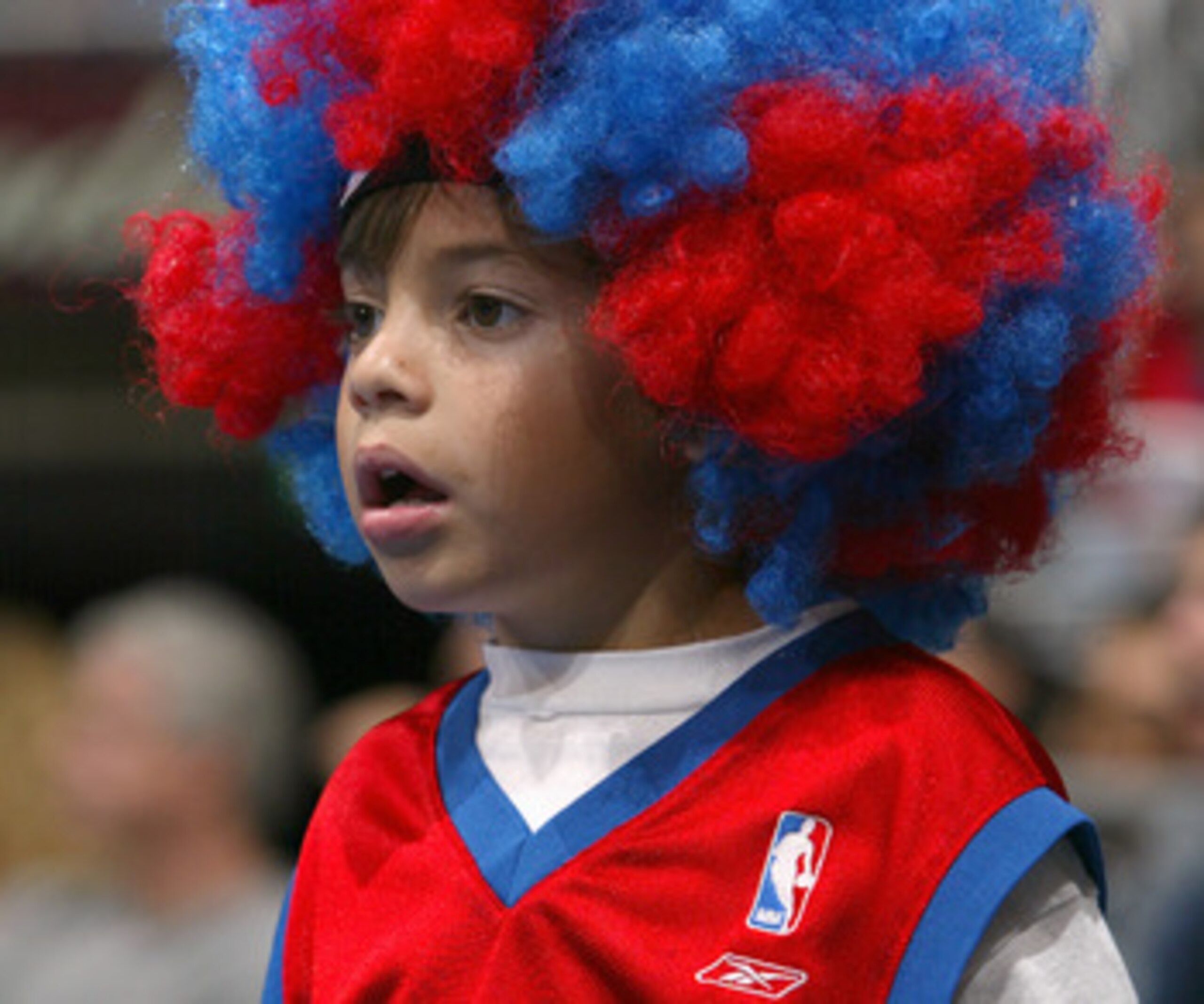 LOS ANGELES - OCTOBER 24:  A Los Angeles Clippers fan watches the action during a preseason game against the New Orleans Hornets on October 24, 2004 at Staples Center in Los Angeles, California. The Clippers won 97-93. NOTE TO USER: User expressly acknowl