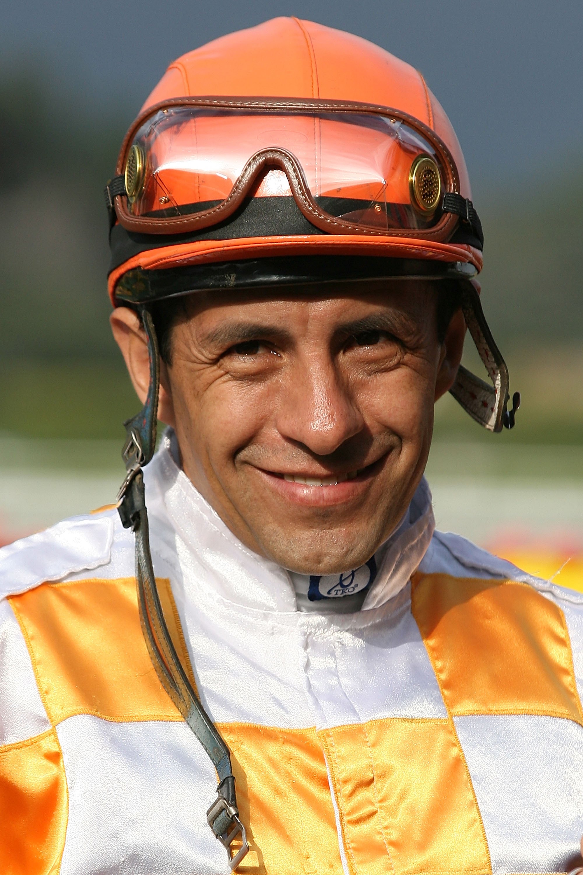 ARCADIA, CA - APRIL 03: Jockey Victor Espinoza smiles after riding Pincelada to victory in the Grey Goose on April 3, 2010 at Santa Anita Race Track in Arcadia, California. (Photo by Jeff Golden/Getty Images)