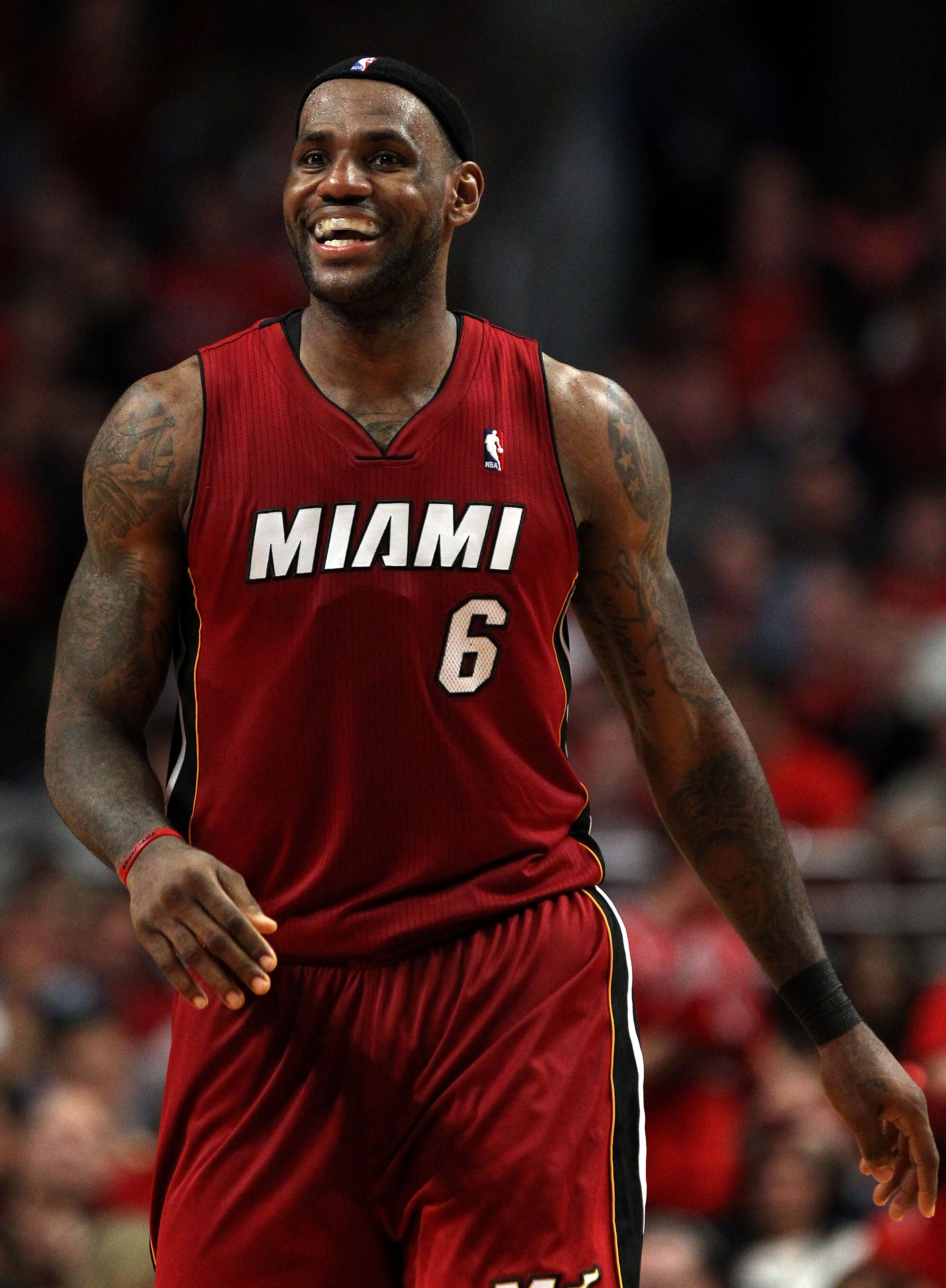 CHICAGO, IL - MAY 18:  LeBron James #6 of the Miami Heat smiles as he looks on against the Chicago Bulls in Game Two of the Eastern Conference Finals during the 2011 NBA Playoffs on May 18, 2011 at the United Center in Chicago, Illinois. The Heat won 85-7