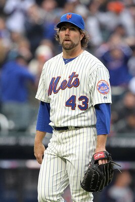 NEW YORK, NY - APRIL 08:  Starting pitcher R.A. Dickey #43 of the New York Mets walks towards the dugout against the Washington Nationals during the Mets' Home Opener at Citi Field on April 8, 2011 in the Flushing neighborhood of Queens in New York City.