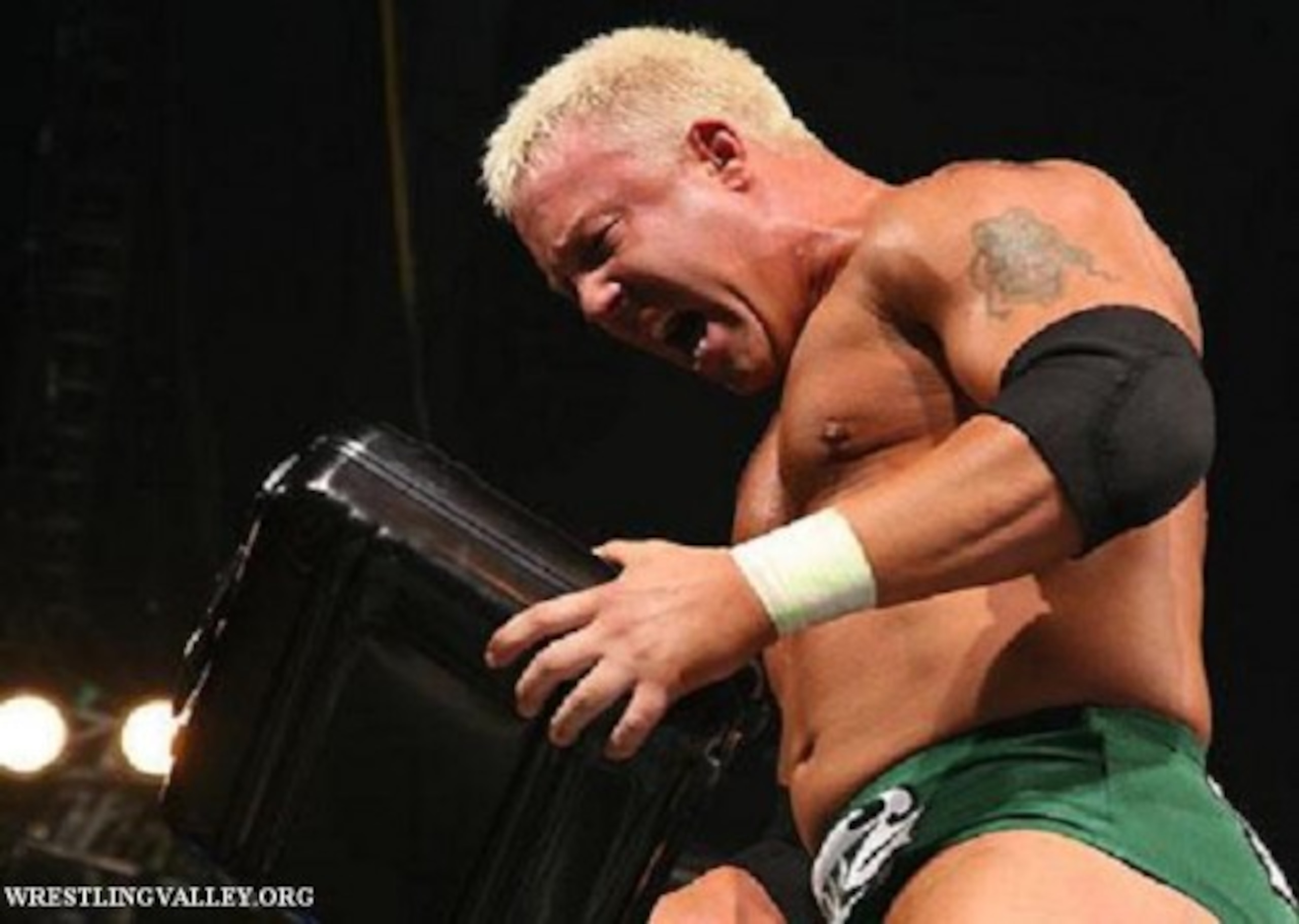 Mr. Kennedy as Mr. Money in the Bank.