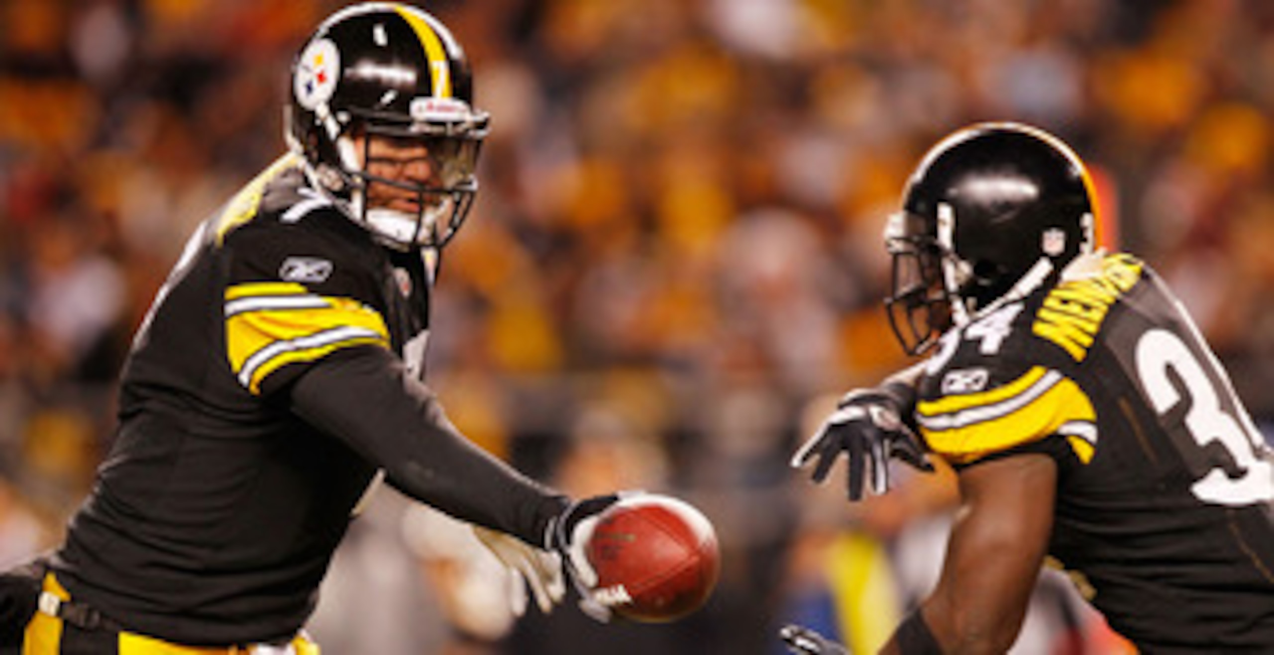 PITTSBURGH - DECEMBER 23: Ben Roethlisberger #7 of the Pittsburgh Steelers hands the ball off to teammate Rashard Mendenhall #34 during the game against the Carolina Panthers on December 23, 2010 at Heinz Field in Pittsburgh, Pennsylvania. (Photo by Ja PITTSBURGH - DECEMBER 23: Ben Roethlisberger #7 of the Pittsburgh Steelers hands the ball off to teammate Rashard Mendenhall #34 during the game against the Carolina Panthers on December 23, 2010 at Heinz Field in Pittsburgh, Pennsylvania. (Photo by Ja