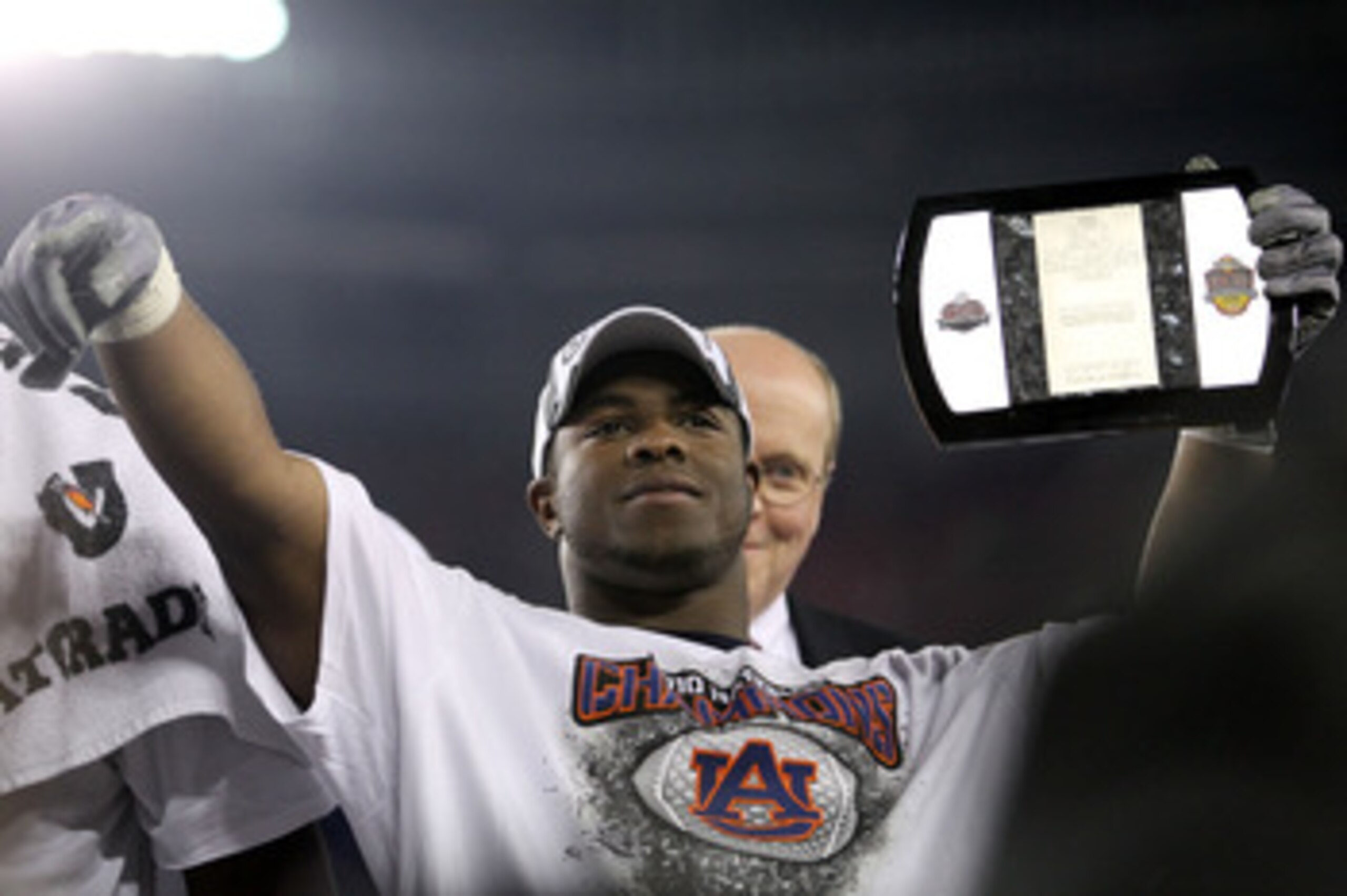 GLENDALE, AZ - JANUARY 10:  Michael Dyer #5 of the Auburn Tigers celebrates their 22 to 19 win over the Oregon Ducks in the Tostitos BCS National Championship Game at University of Phoenix Stadium on January 10, 2011 in Glendale, Arizona.  (Photo by Ronal