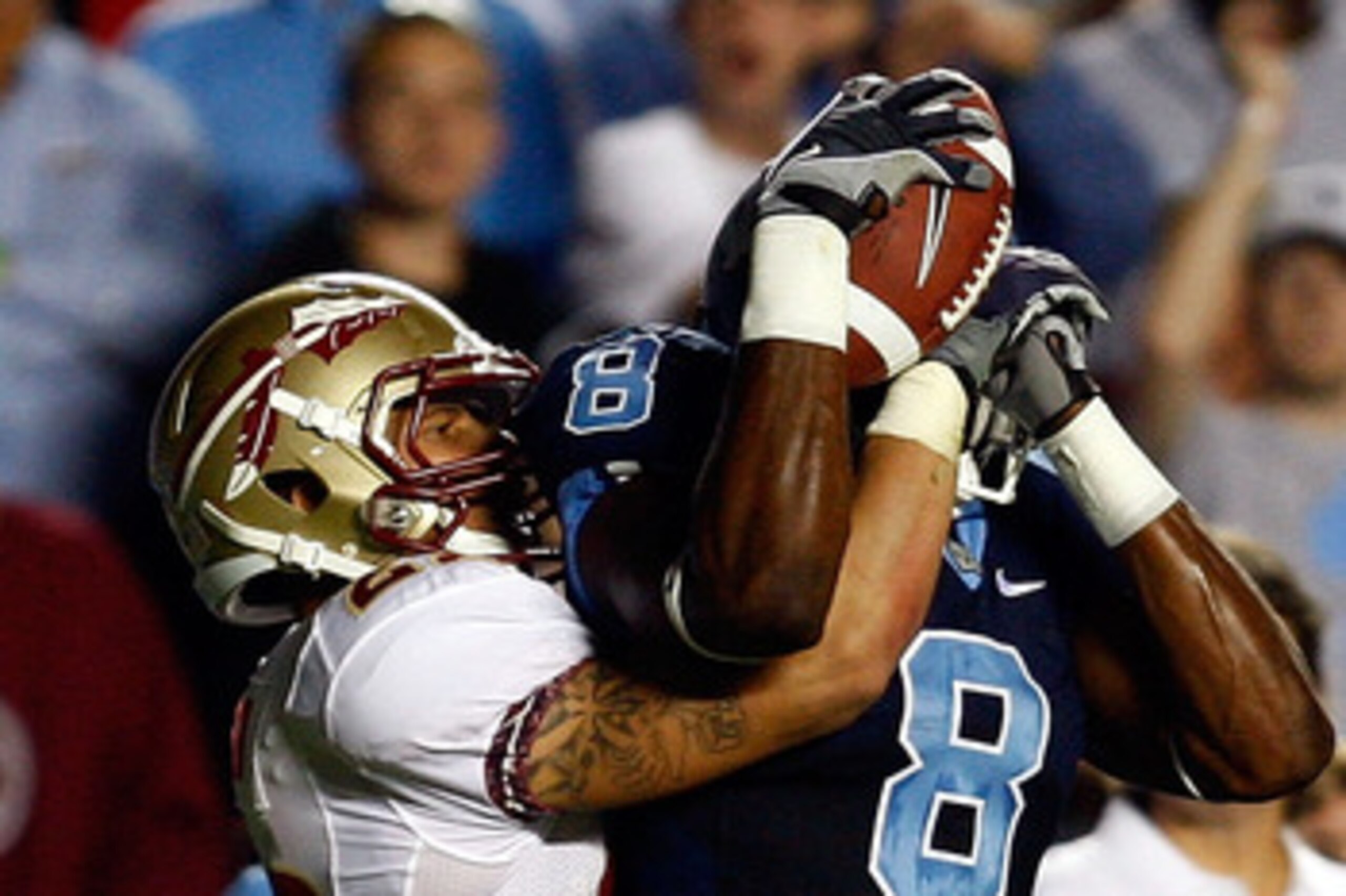 CHAPEL HILL, NC - OCTOBER 22:  Greg Little #8 of the North Carolina Tar Heels makes a catch against Florida State Seminole defender Korey Mangum #22  at Kenan Stadium on October 22, 2009 in Chapel Hill, North Carolina.  (Photo by Scott Halleran/Getty Imag
