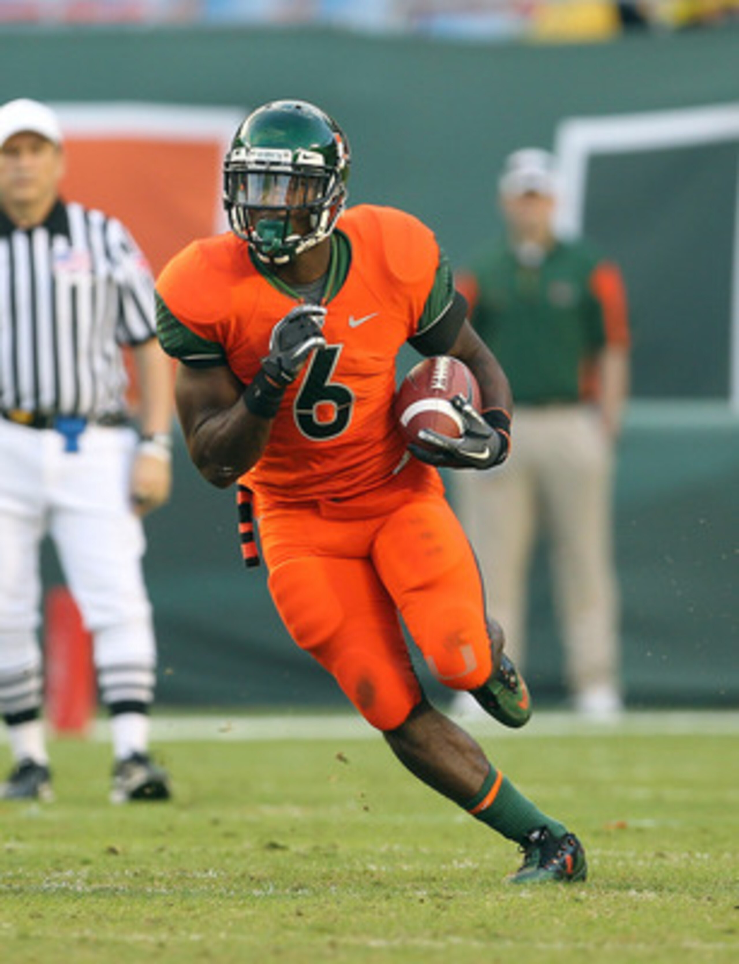 MIAMI - NOVEMBER 20:  Lamar Miller #6 of the Miami Hurricanes runs for a touchdown during a game against the Virginia Tech Hokies at Sun Life Stadium on November 20, 2010 in Miami, Florida.  (Photo by Mike Ehrmann/Getty Images)