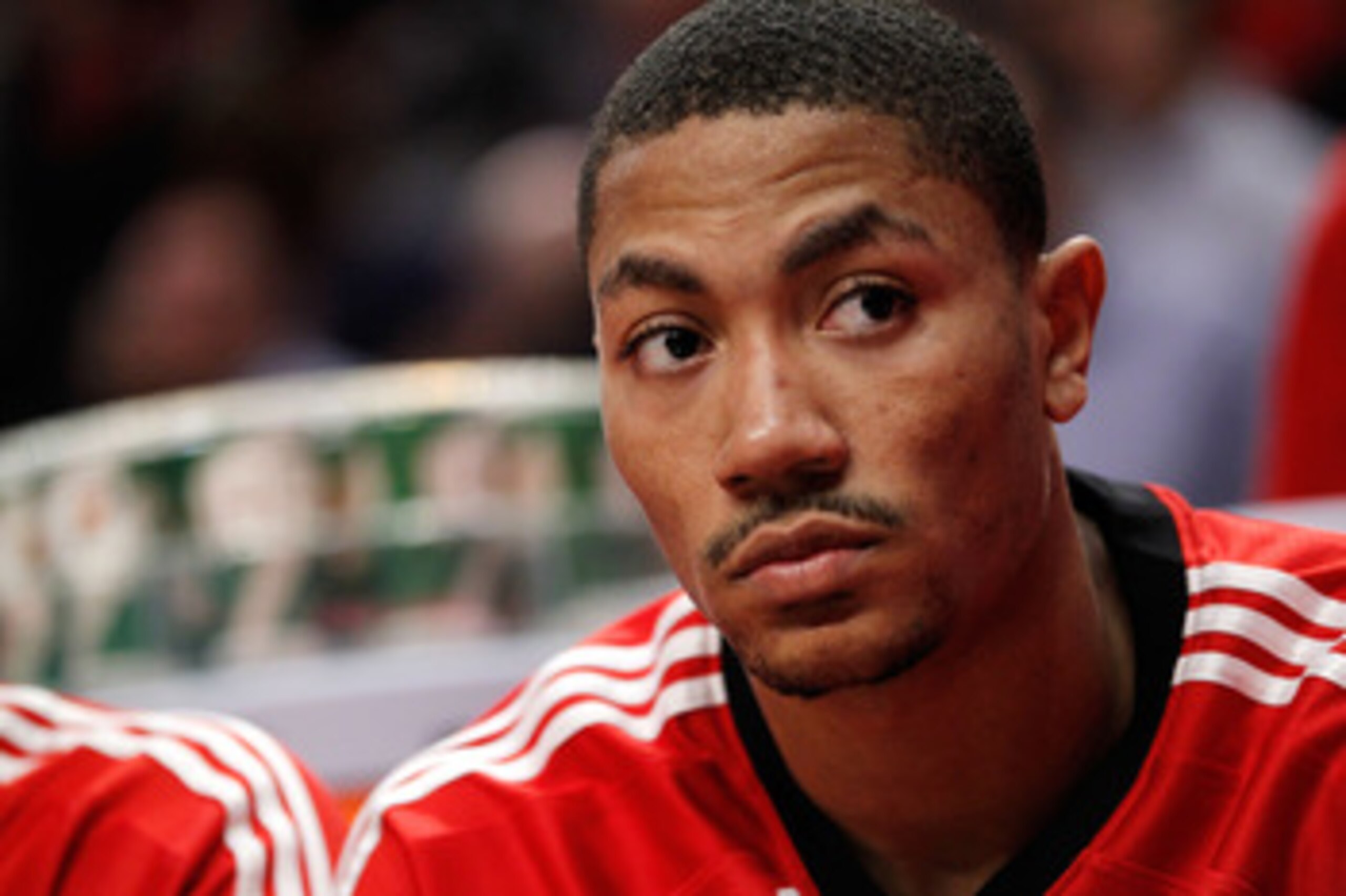 CHICAGO, IL - MAY 18:  Derrick Rose #1 of the Chicago Bulls looks on from the bench against the Chicago Bulls in Game Two of the Eastern Conference Finals during the 2011 NBA Playoffs on May 18, 2011 at the United Center in Chicago, Illinois. The Heat won