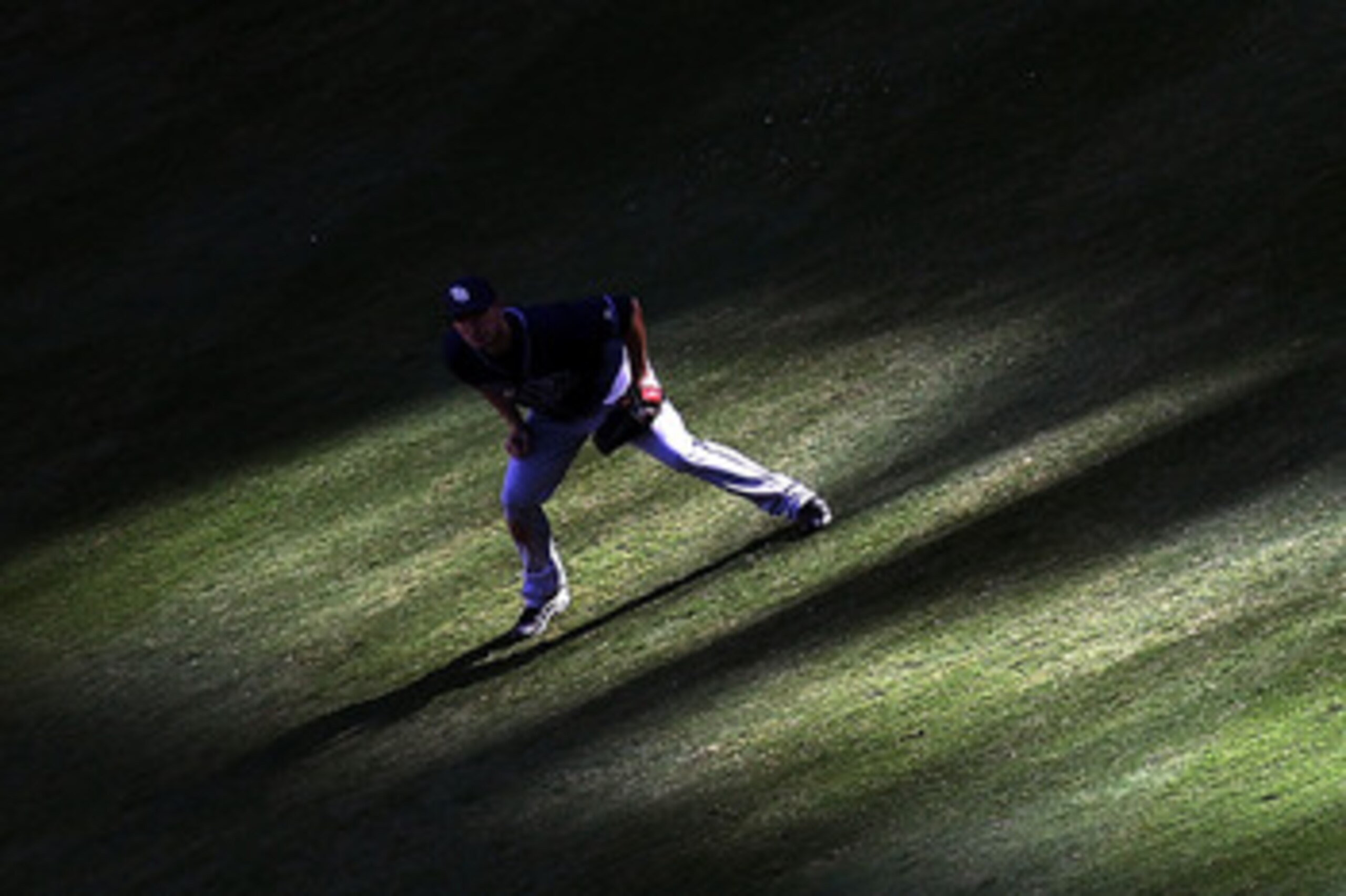 ARLINGTON, TX - OCTOBER 09:  Right fielder Matt Joyce #20 of the Tampa Bay Rays runs for a play against the Texas Rangers during game 3 of the ALDS at Rangers Ballpark in Arlington on October 9, 2010 in Arlington, Texas.  (Photo by Ronald Martinez/Getty I