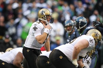SEATTLE, WA - JANUARY 08: Drew Brees #9 of the New Orleans Saints calls a play against the Seattle Seahawks during the 2011 NFC wild-card playoff game at Qwest Field on January 8, 2011 in Seattle, Washington. (Photo by Jonathan Ferrey/Getty Images) SEATTLE, WA - JANUARY 08: Drew Brees #9 of the New Orleans Saints calls a play against the Seattle Seahawks during the 2011 NFC wild-card playoff game at Qwest Field on January 8, 2011 in Seattle, Washington. (Photo by Jonathan Ferrey/Getty Images)