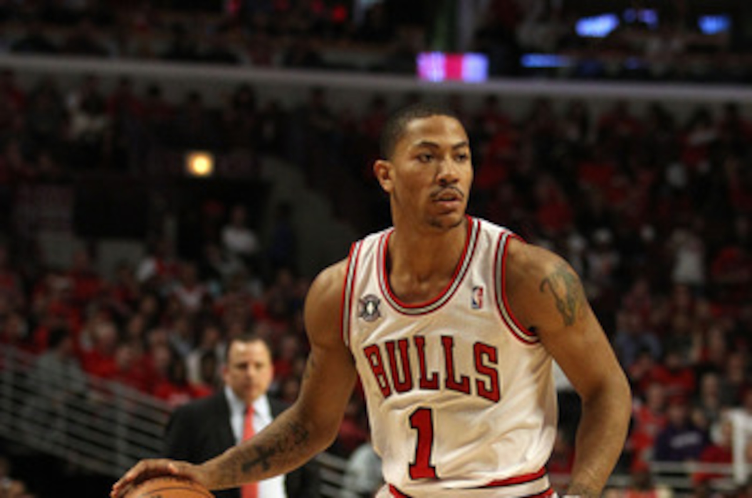 CHICAGO, IL - MAY 15:  Derrick Rose #1 of the Chicago Bulls looks to pass against the Miami Heat in Game One of the Eastern Conference Finals during the 2011 NBA Playoffs on May 15, 2011 at the United Center in Chicago, Illinois. The Bulls won 103-82. NOT