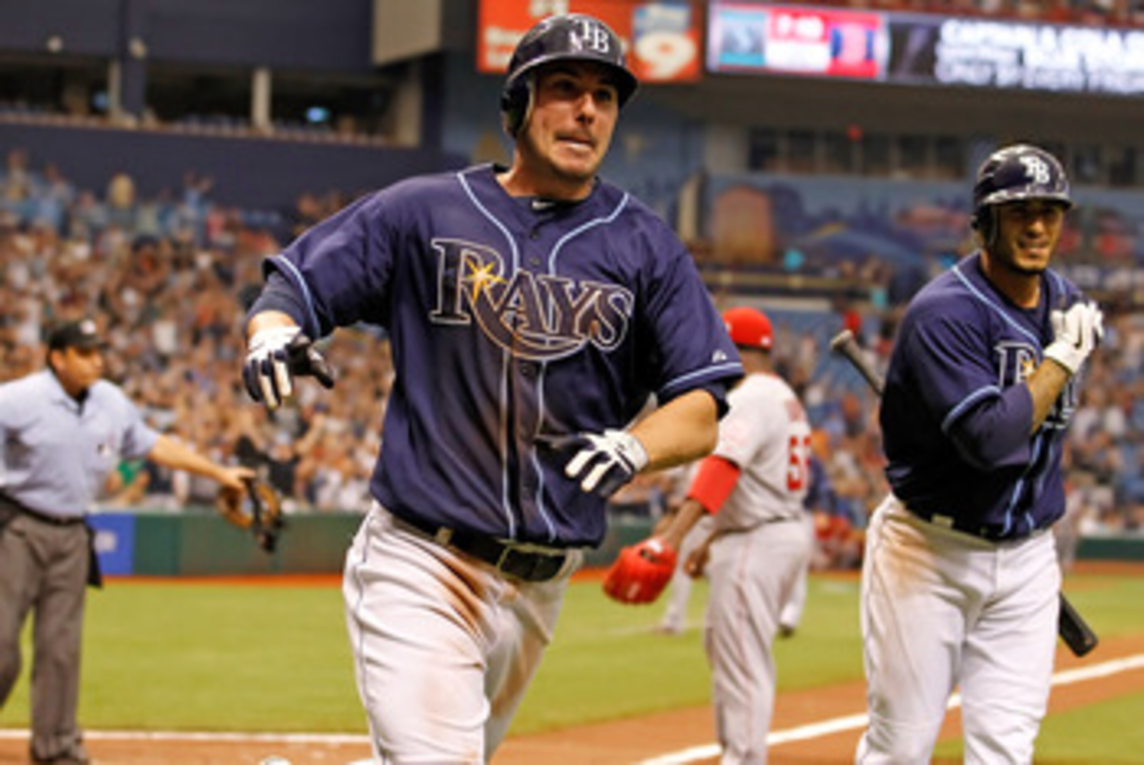 ST. PETERSBURG, FL - APRIL 30:  Outfielder Matt Joyce #20 of the Tampa Bay Rays scores the game winning run in the tenth inning against the Los Angeles Angels of Anaheim at Tropicana Field on April 30, 2011 in St. Petersburg, Florida.  (Photo by J. Meric/