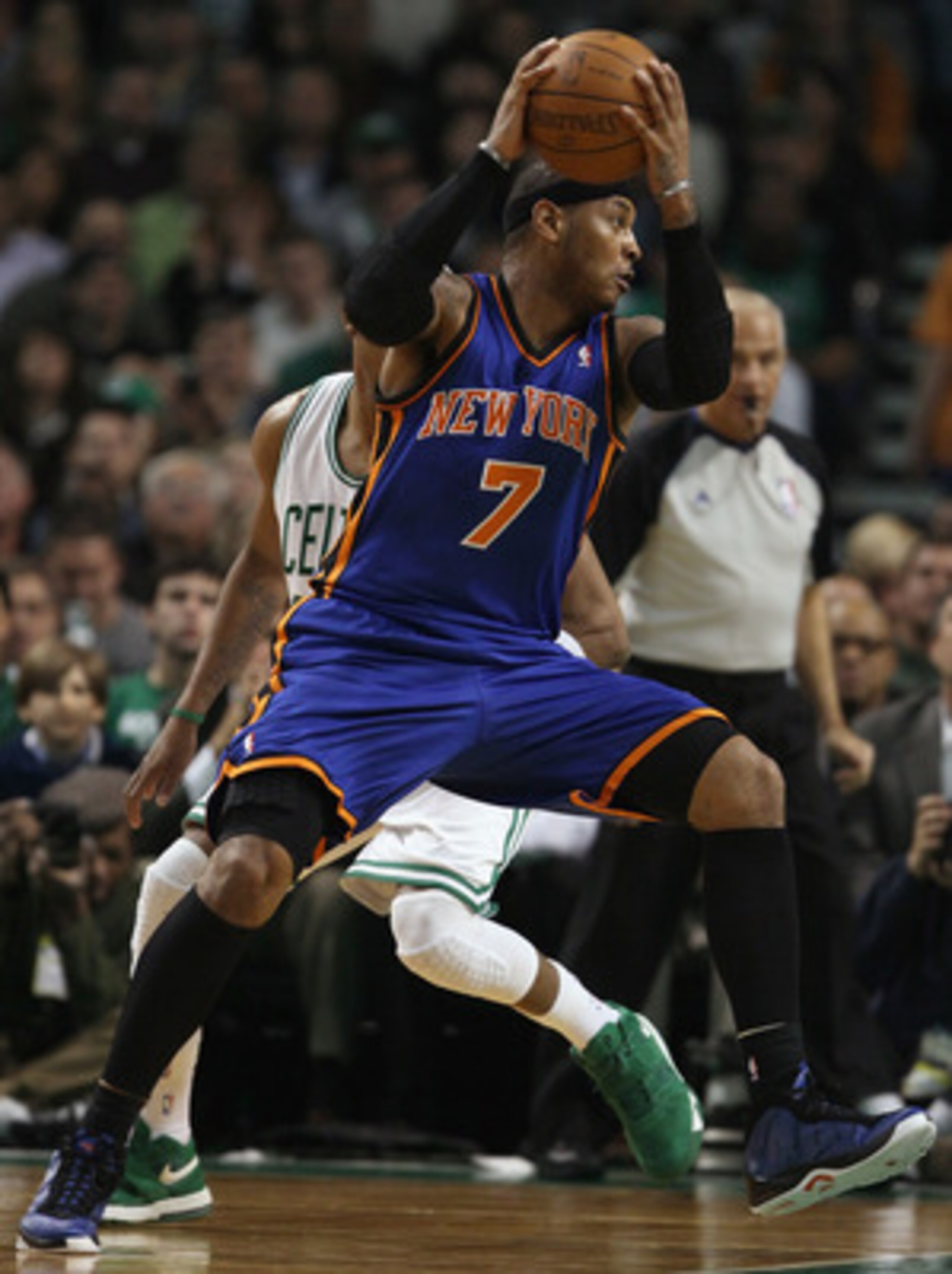 BOSTON, MA - APRIL 19:  Carmelo Anthony #7 of the New York Knicks heads for the net as Paul Pierce #34 of the Boston Celtics defends in Game Two of the Eastern Conference Quarterfinals in the 2011 NBA Playoffs on April 19, 2011 at the TD Garden in Boston,