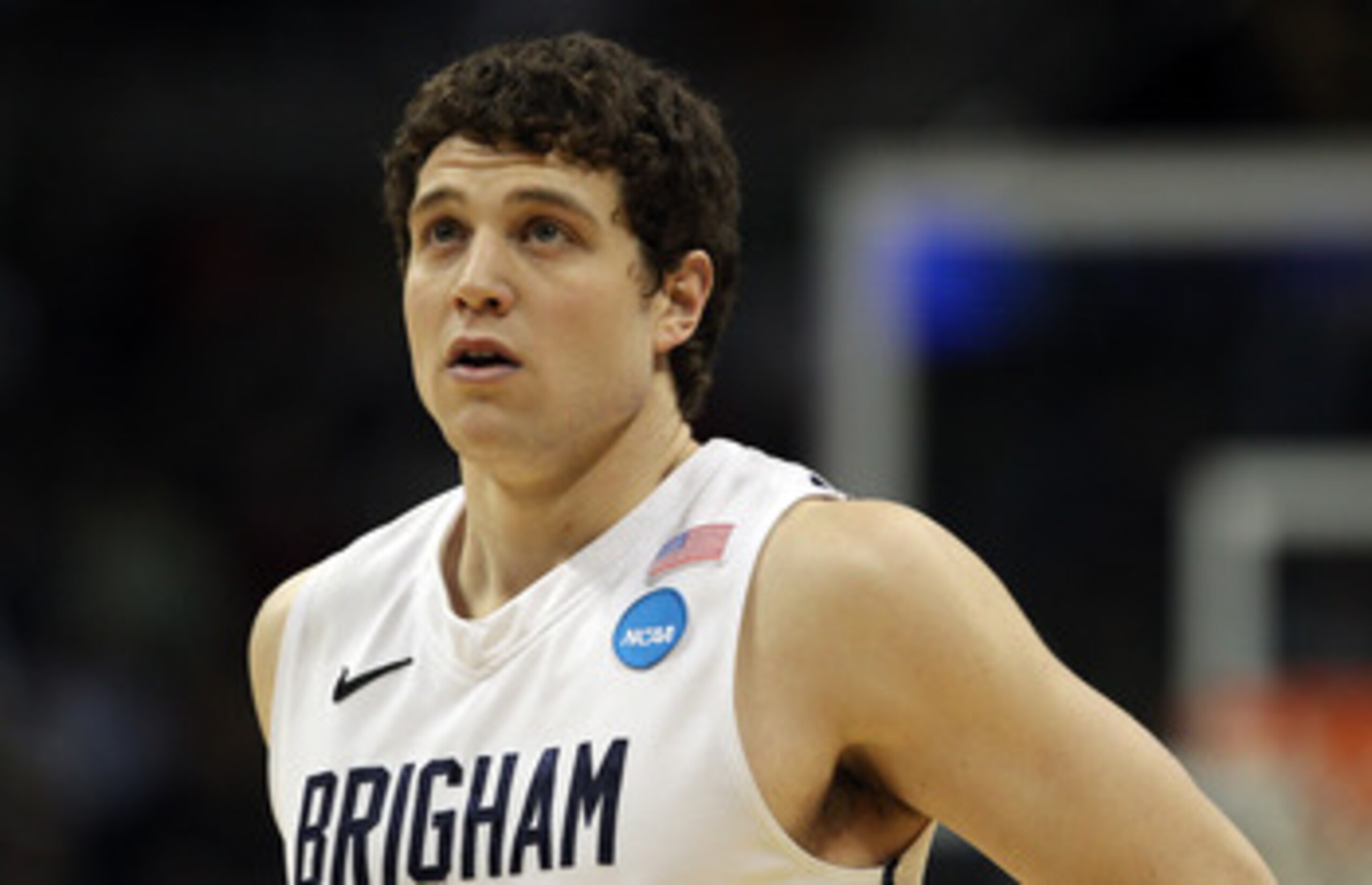DENVER, CO - MARCH 17:  Jimmer Fredette #32 of the Brigham Young Cougars looks on against the Wofford Terriers during the second round of the 2011 NCAA men's basketball tournament at Pepsi Center on March 17, 2011 in Denver, Colorado.  (Photo by Justin Ed