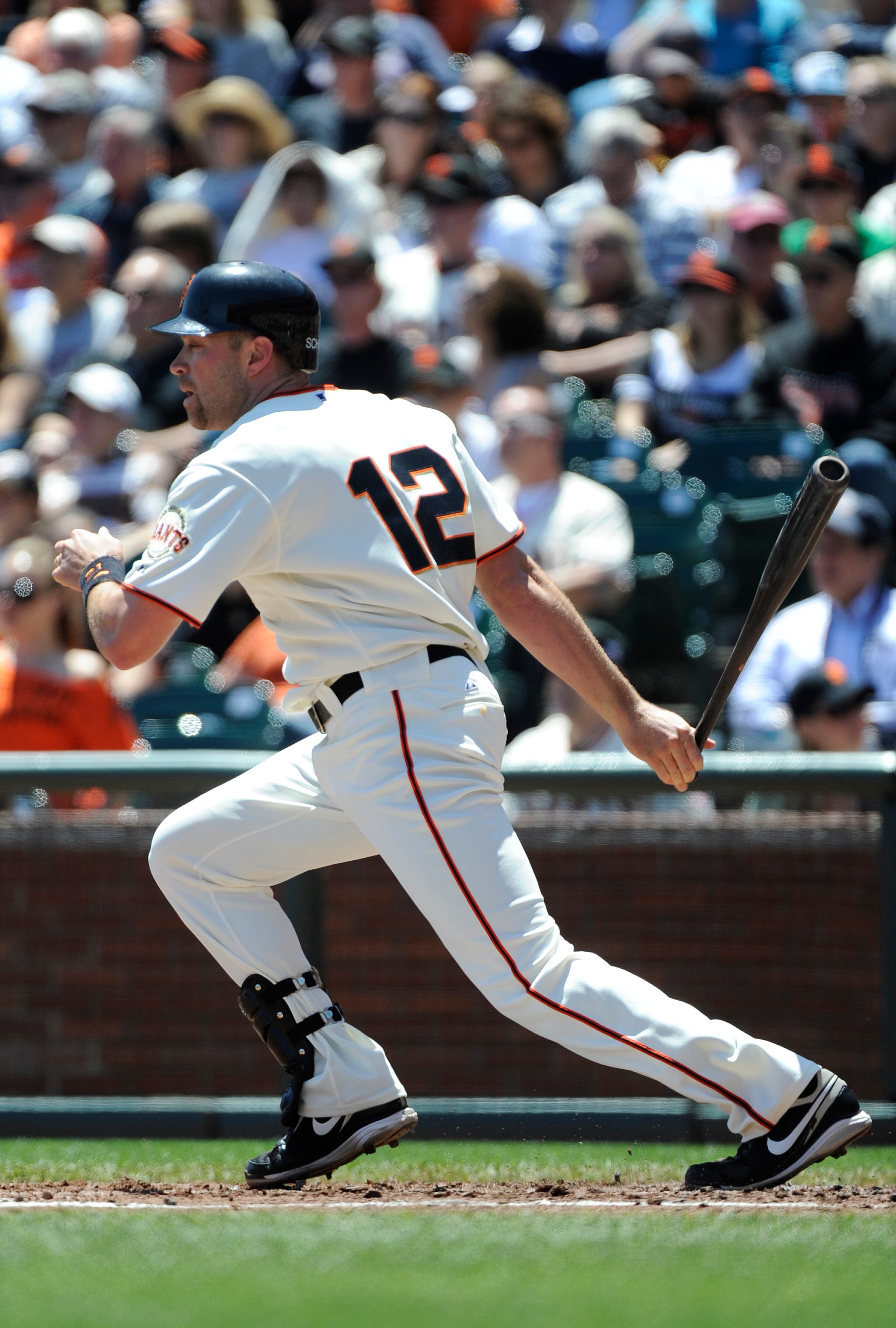 SAN FRANCISCO, CA - MAY 12: Nate Schierholtz #12 of the San Francisco Giants hits an RBI single in the bottom of the second inning against the Arizona Diamondbacks during a MLB baseball game at AT&T Park May 12, 2011 in San Francisco, California. (Photo b