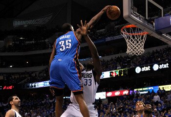 DALLAS, TX - MAY 19: Kevin Durant #35 of the Oklahoma City Thunder dunks the ball over Brendan Haywood #33 of the Dallas Mavericks as Haywood is called for a foul in the first quarter in Game Two of the Western Conference Finals during the 2011 NBA Playo DALLAS, TX - MAY 19: Kevin Durant #35 of the Oklahoma City Thunder dunks the ball over Brendan Haywood #33 of the Dallas Mavericks as Haywood is called for a foul in the first quarter in Game Two of the Western Conference Finals during the 2011 NBA Playo
