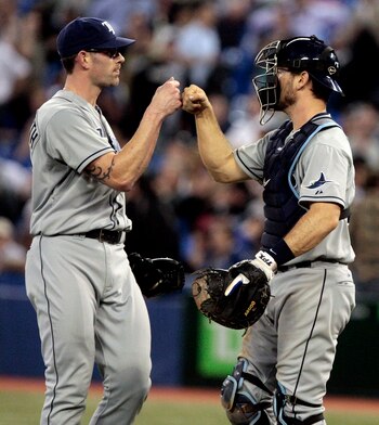 TORONTO, CANADA - MAY 18: Kyle Farnsworth #43 and John Jaso #28 of the Tampa Bay Rays celebrate win against the Toronto Blue Jays during MLB action at the Rogers Centre May 18, 2011 in Toronto, Ontario, Canada. (Photo by Abelimages/Getty Images)