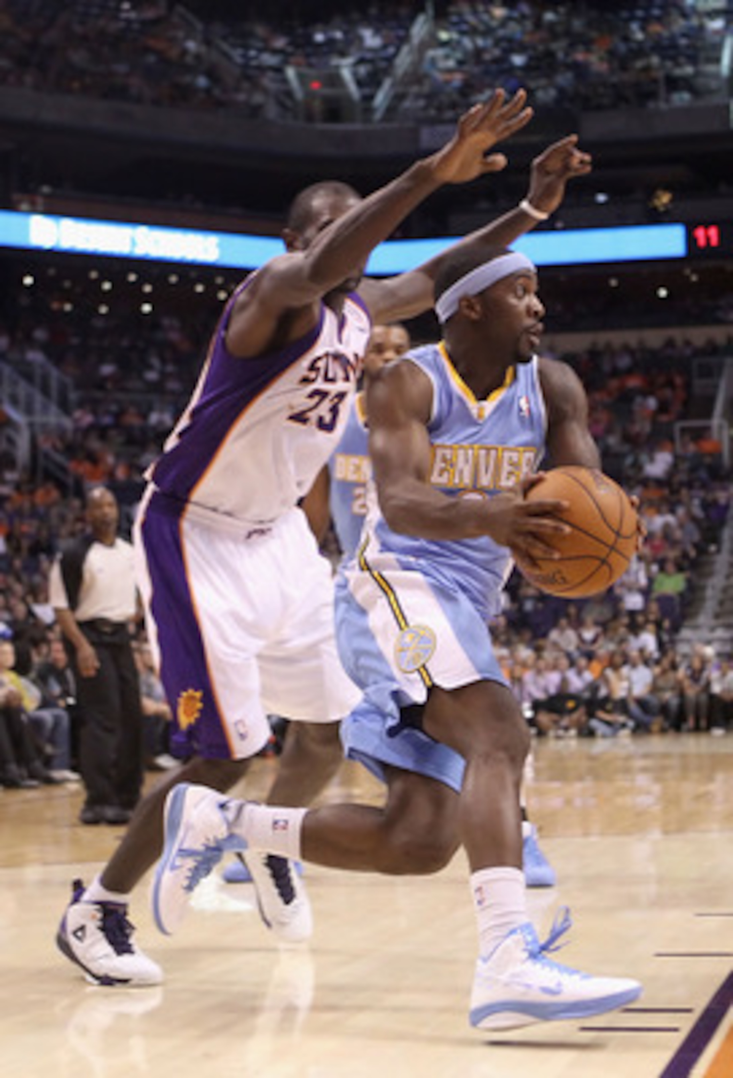 PHOENIX - OCTOBER 22:  Ty Lawson #3 of the Denver Nuggets handles the ball during the preseason NBA game against the Phoenix Suns at US Airways Center on October 22, 2010 in Phoenix, Arizona. NOTE TO USER: User expressly acknowledges and agrees that, by d