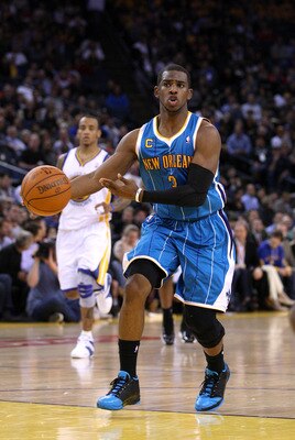 OAKLAND, CA - JANUARY 26: Chris Paul #3 of the New Orleans Hornets passes the ball during their game against the Golden State Warriors at Oracle Arena on January 26, 2011 in Oakland, California. NOTE TO USER: User expressly acknowledges and agrees that, OAKLAND, CA - JANUARY 26: Chris Paul #3 of the New Orleans Hornets passes the ball during their game against the Golden State Warriors at Oracle Arena on January 26, 2011 in Oakland, California. NOTE TO USER: User expressly acknowledges and agrees that,