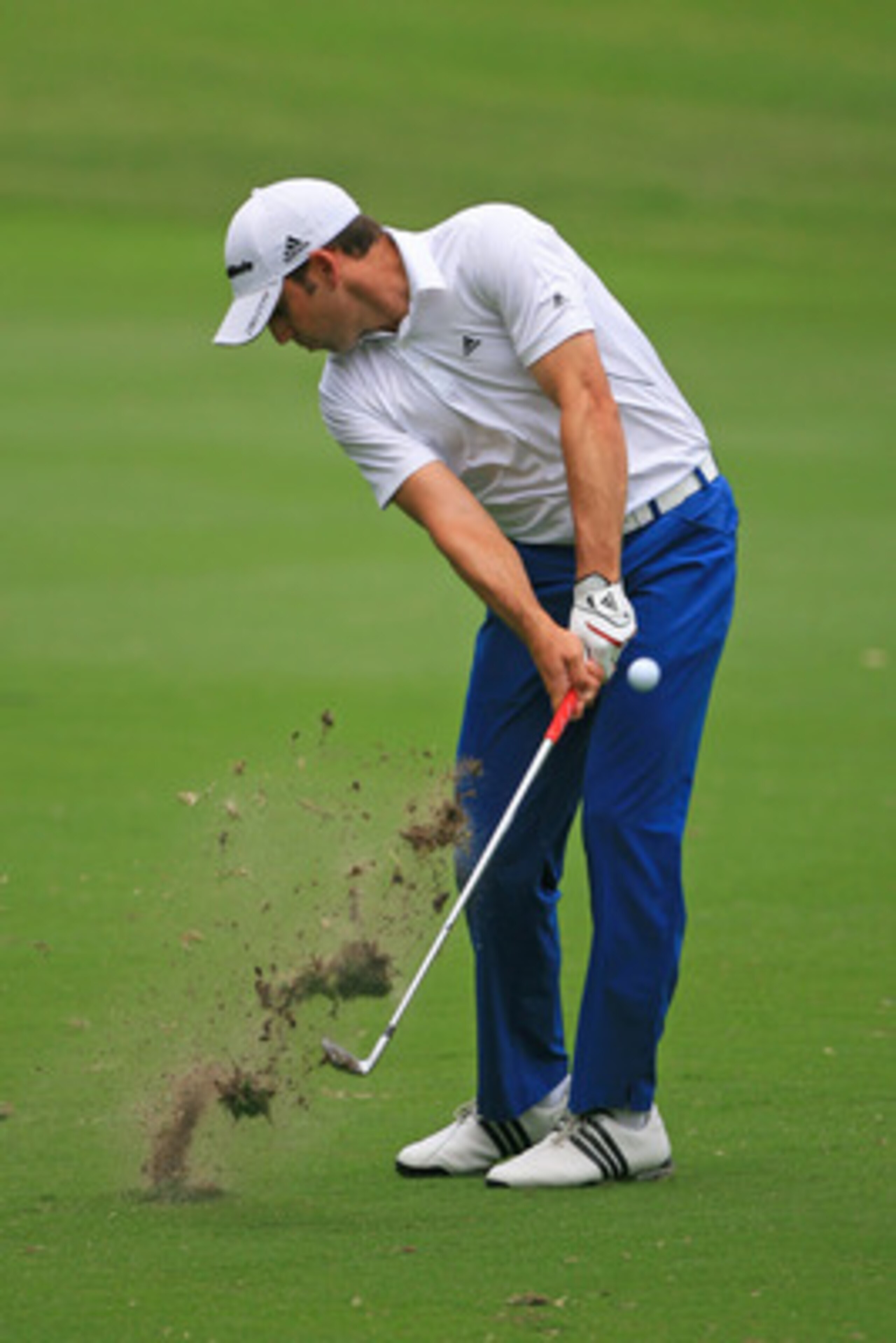 FT. WORTH, TX - MAY 19: Sergio Garcia of Spain hits his second shot on the ninth hole during the first round of the Crowne Plaza Invitational at Colonial Country Club on May 19, 2011 in Ft. Worth, Texas. (Photo by Hunter Martin/Getty Images)