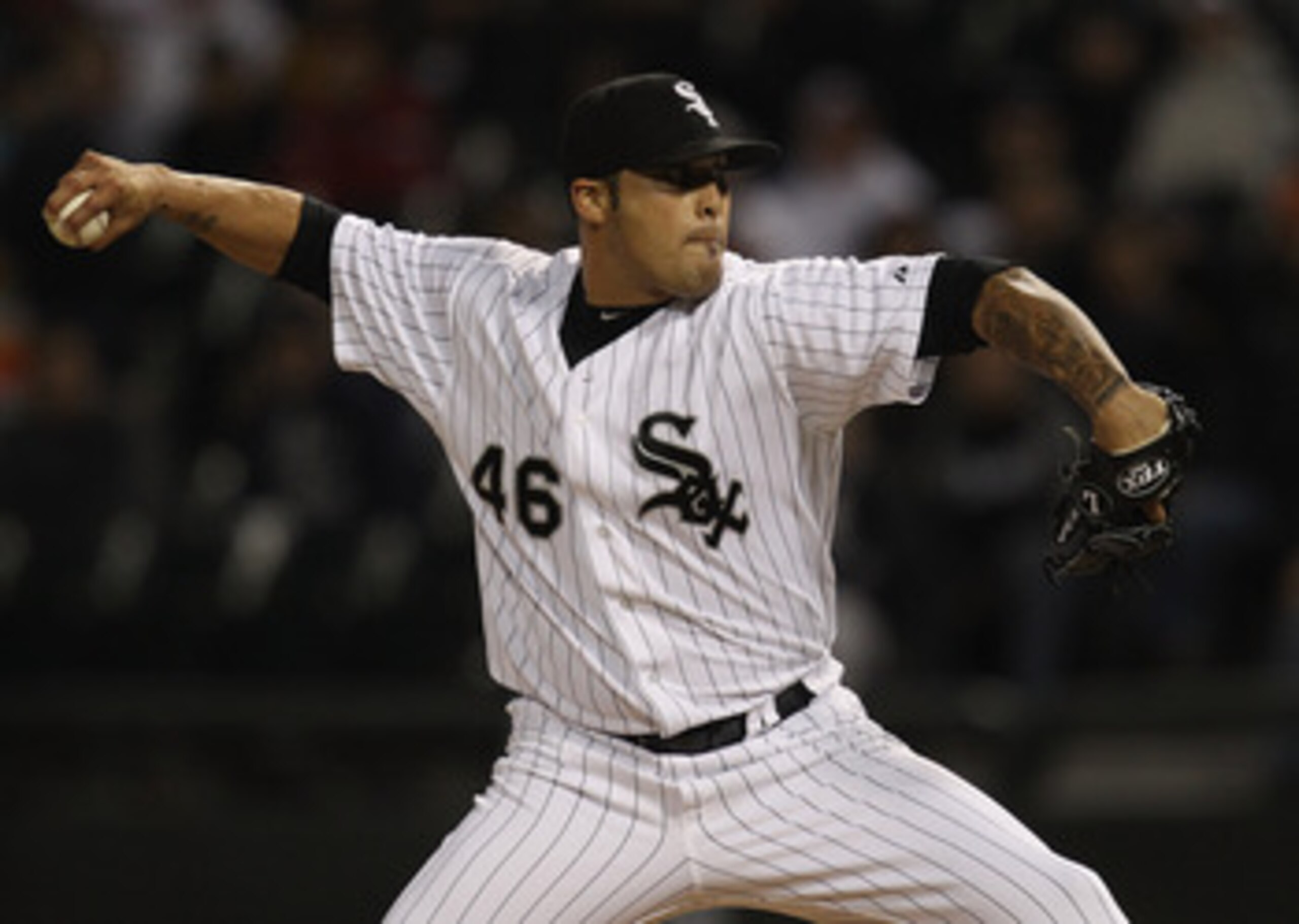 CHICAGO, IL - MAY 17: Sergio Santos #46 of the Chicago White Sox pitches for a save in the 9th inning against the Texas Rangers at U.S. Cellular Field on May 17, 2011 in Chicago, Illinois. The White Sox defeated the Rangers 4-3. (Photo by Jonathan Daniel/