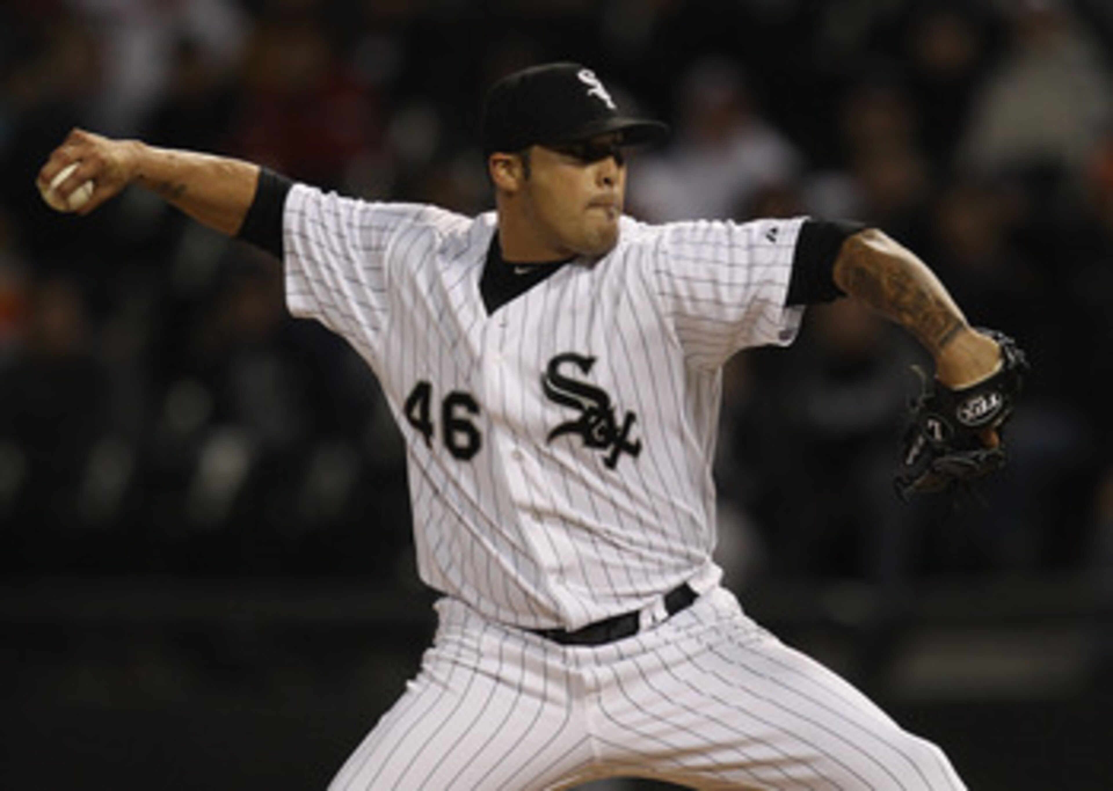 CHICAGO, IL - MAY 17: Sergio Santos #46 of the Chicago White Sox pitches for a save in the 9th inning against the Texas Rangers at U.S. Cellular Field on May 17, 2011 in Chicago, Illinois. The White Sox defeated the Rangers 4-3. (Photo by Jonathan Daniel/
