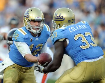 PASADENA, CA - NOVEMBER 06: Richard Brehaut #12 of the UCLA Bruins handsoff to Derrick Coleman #33 against the Oregon State Beavers at the Rose Bowl on November 6, 2010 in Pasadena, California. (Photo by Harry How/Getty Images) PASADENA, CA - NOVEMBER 06: Richard Brehaut #12 of the UCLA Bruins handsoff to Derrick Coleman #33 against the Oregon State Beavers at the Rose Bowl on November 6, 2010 in Pasadena, California. (Photo by Harry How/Getty Images)