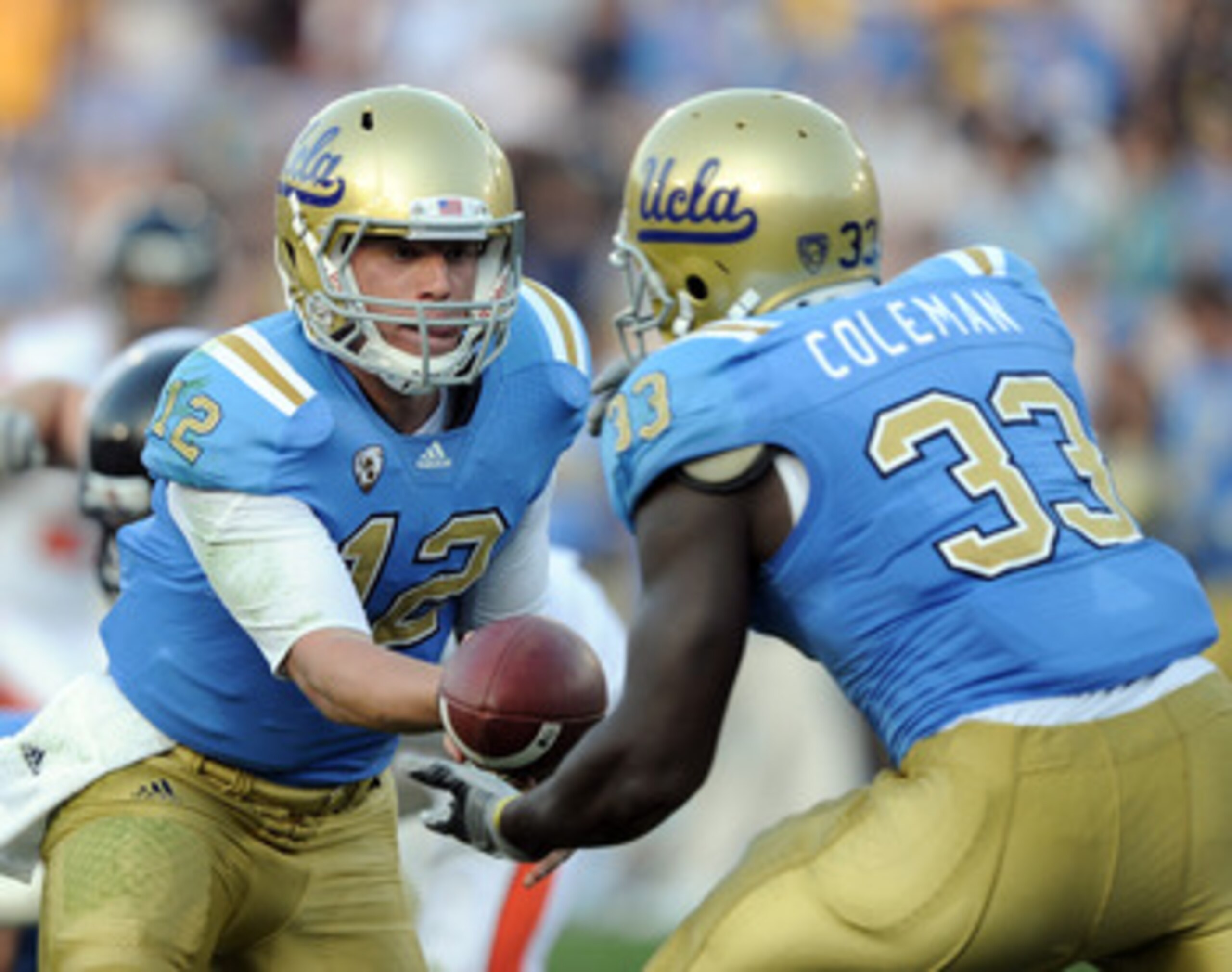 PASADENA, CA - NOVEMBER 06: Richard Brehaut #12 of the UCLA Bruins handsoff to Derrick Coleman #33 against the Oregon State Beavers at the Rose Bowl on November 6, 2010 in Pasadena, California. (Photo by Harry How/Getty Images) PASADENA, CA - NOVEMBER 06: Richard Brehaut #12 of the UCLA Bruins handsoff to Derrick Coleman #33 against the Oregon State Beavers at the Rose Bowl on November 6, 2010 in Pasadena, California. (Photo by Harry How/Getty Images)