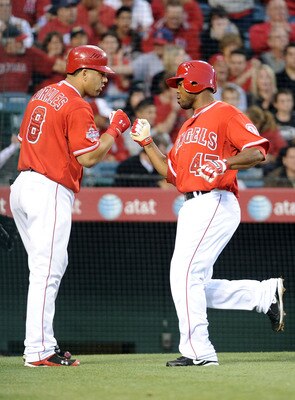 ANAHEIM, CA - MAY 25:  Howard Kendrick #47 of the  Los Angeles Angels celebrates his run with Kendry Morales #8 for a 5-0 lead over the Toronto Blue Jay during the second inning at Angel Stadium on May 25, 2010 in Anaheim, California.  (Photo by Harry How