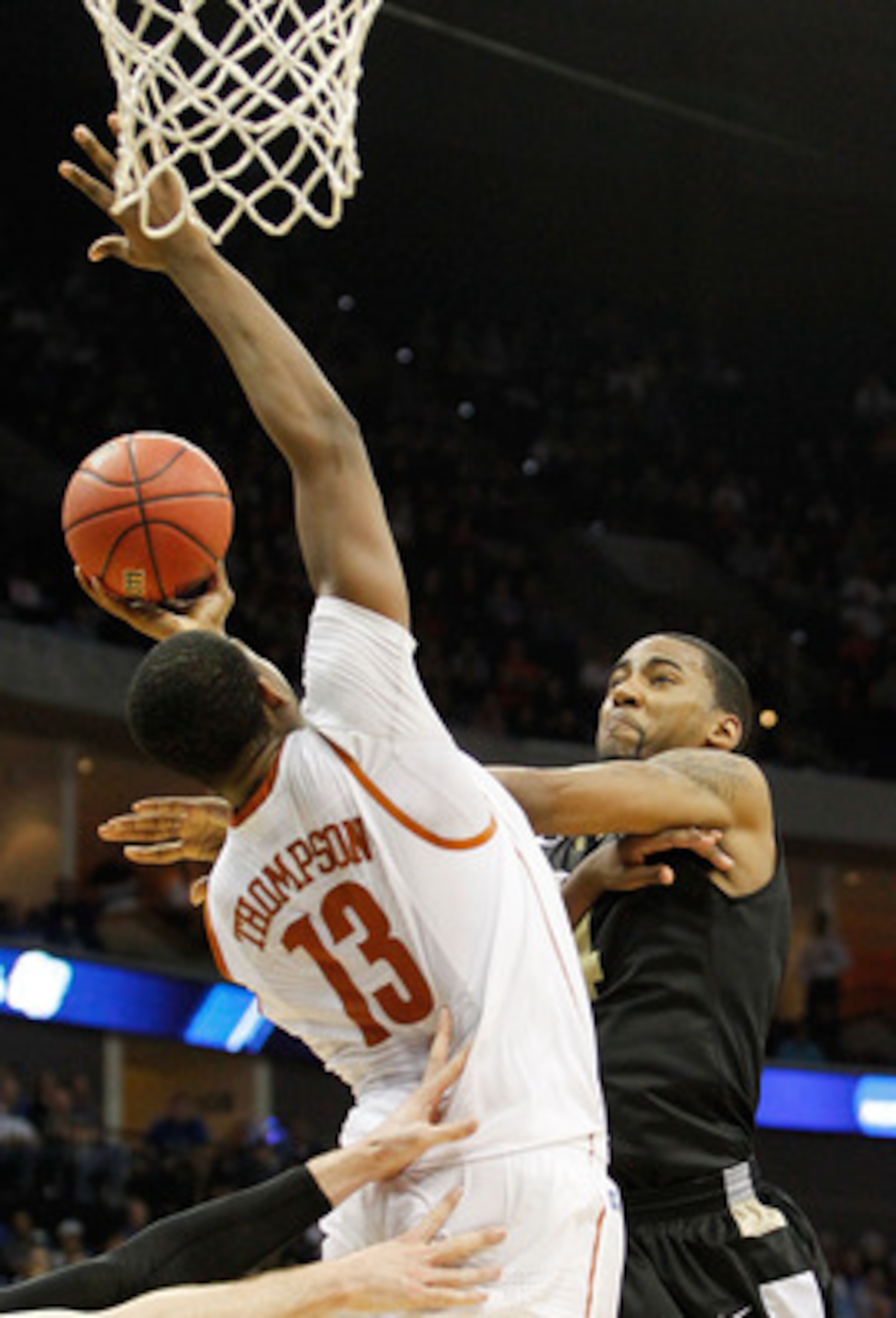 TULSA, OK - MARCH 18:  Keith Benson #34 of the Oakland Golden Grizzlies goes up for a shot against Tristan Thompson #13 of the Texas Longhorns during the second round of the 2011 NCAA men's basketball tournament at BOK Center on March 18, 2011 in Tulsa, O