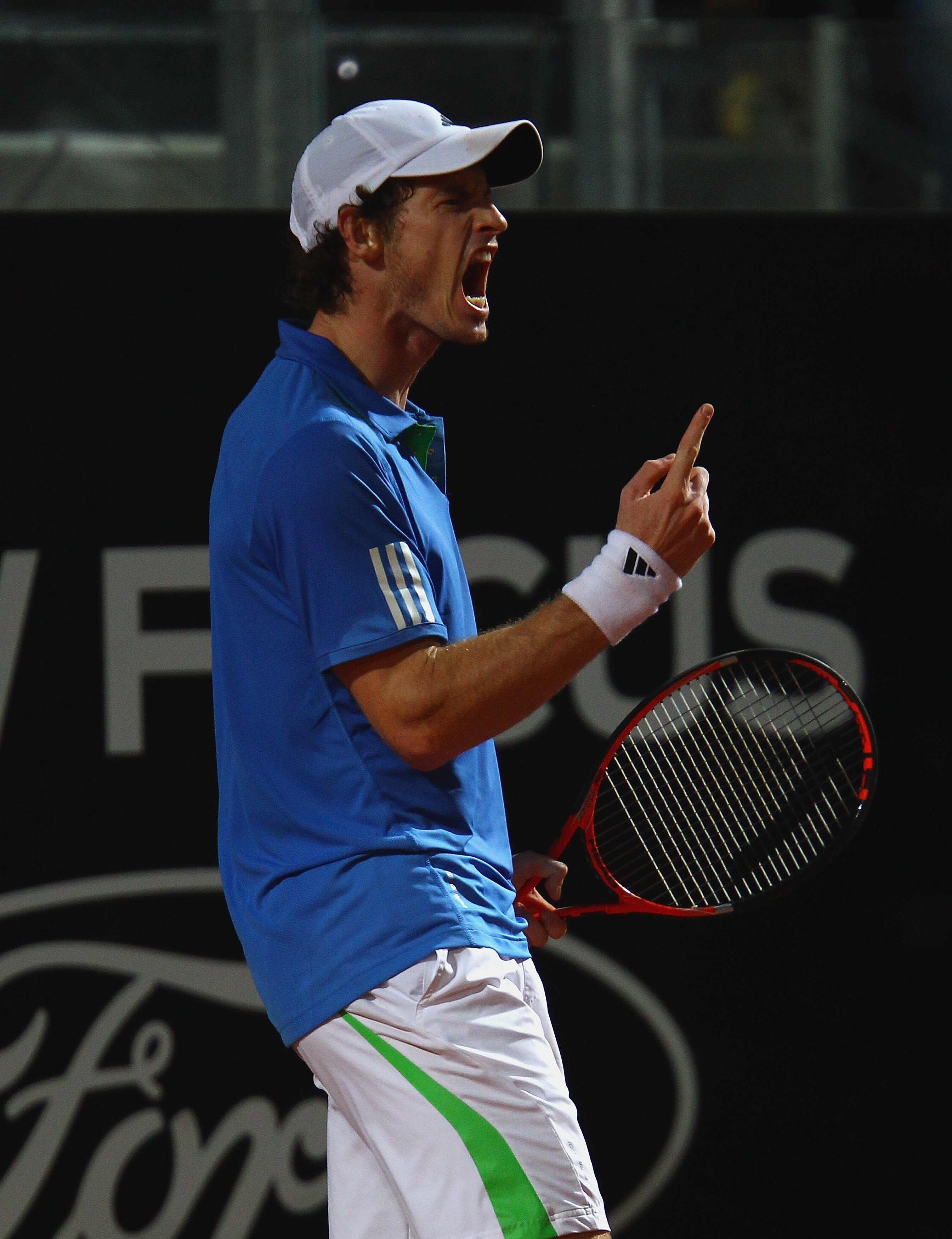 ROME, ITALY - MAY 14:  Andy Murray of Great Britain shows his frustrations after a point during his semi final match against Novak Djokovic of Serbia during day seven of the Internazoinali BNL D'Italia at the Foro Italico Tennis Centre  on May 14, 2011 in