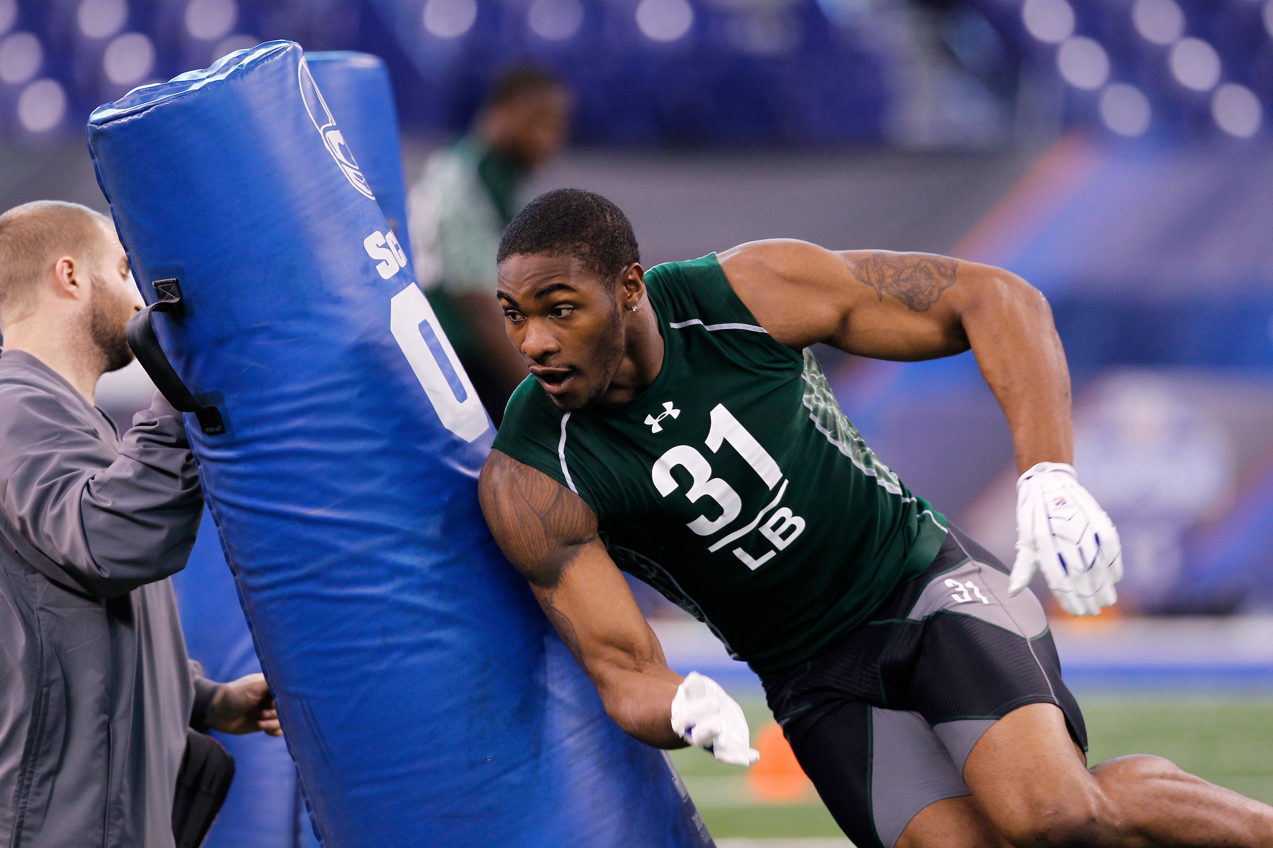 INDIANAPOLIS, IN - FEBRUARY 28: Martez Wilson of Illinois works out during the 2011 NFL Scouting Combine at Lucas Oil Stadium on February 28, 2011 in Indianapolis, Indiana. (Photo by Joe Robbins/Getty Images) INDIANAPOLIS, IN - FEBRUARY 28: Martez Wilson of Illinois works out during the 2011 NFL Scouting Combine at Lucas Oil Stadium on February 28, 2011 in Indianapolis, Indiana. (Photo by Joe Robbins/Getty Images)