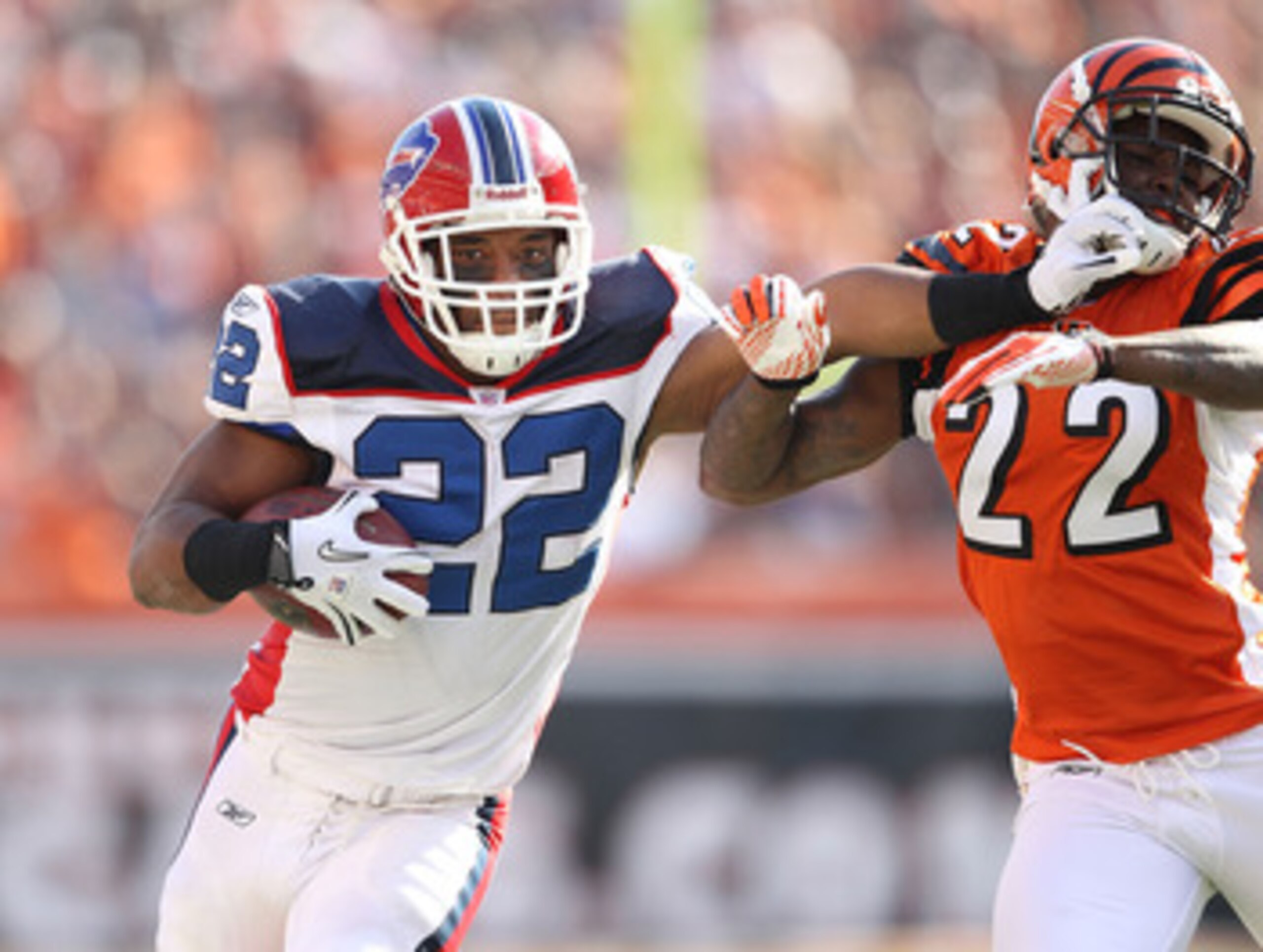 CINCINNATI - NOVEMBER 21:  Fred Jackson #22 of the Buffalo Bills runs with the ball while defended by Johnathan Joseph #22 of the Cincinnati Bengals during the NFL game at Paul Brown Stadium on November 21, 2010 in Cincinnati, Ohio. The Bills won 49-21.  