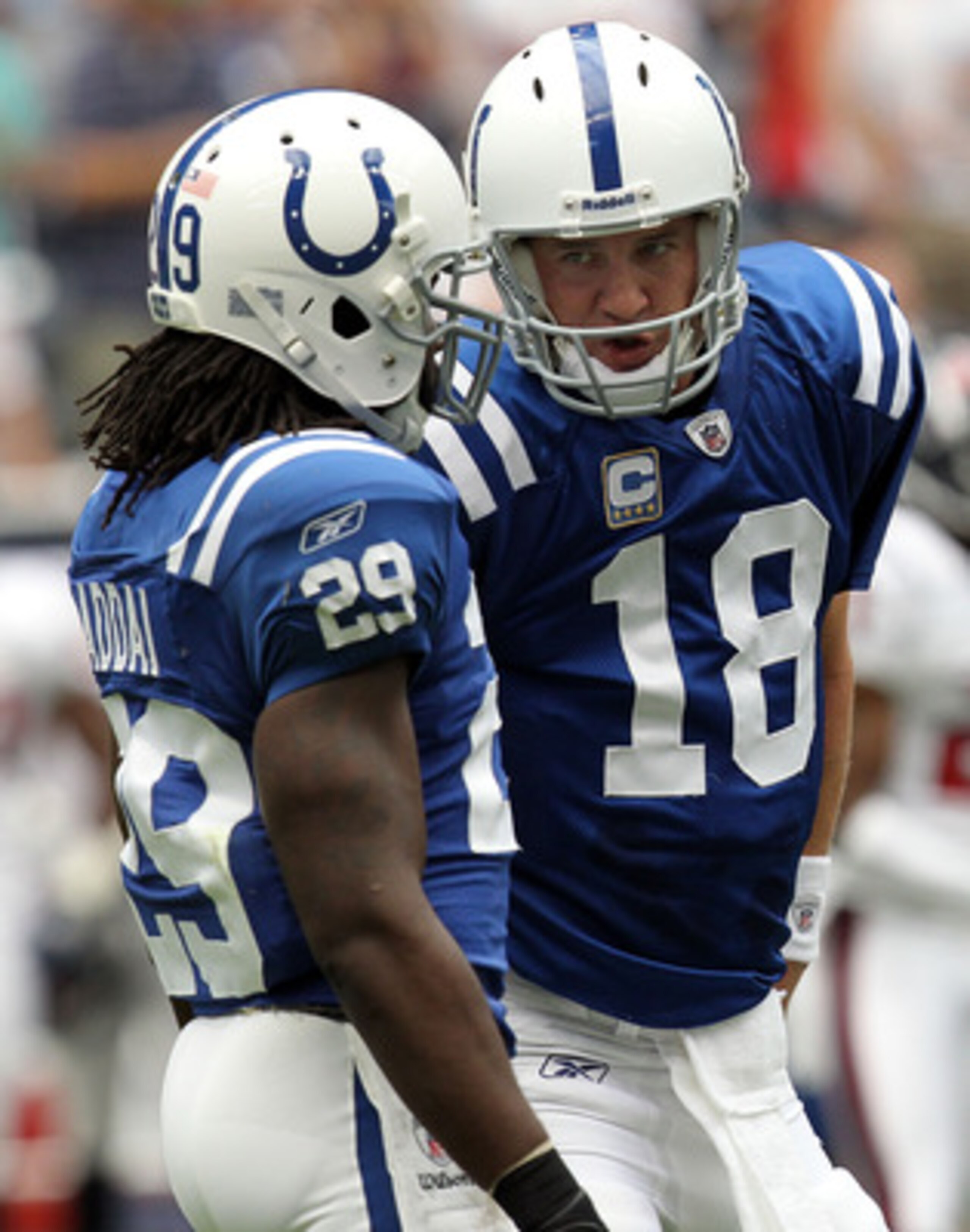 HOUSTON - SEPTEMBER 12:  Quarterback Peyton Manning #18 and Joseph Addai #29 of the Indianapolis Colts in the NFL season opener against the Houston Texans at Reliant Stadium on September 12, 2010 in Houston, Texas.  (Photo by Ronald Martinez/Getty Images)