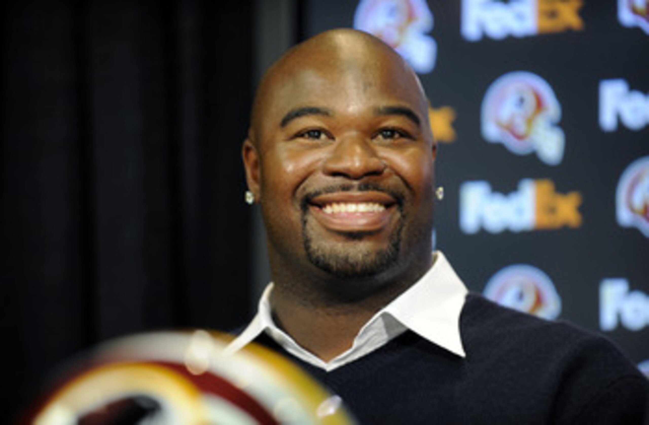 ASHBURN, VA - FEBRUARY 27:  Albert Haynesworth attends a press conference after signing a 7-year contract worth approximately $100 million with the Washington Redskins on February 27, 2009 at Redskins Park in Ashburn, Virginia.  (Photo by Mitchell Layton/