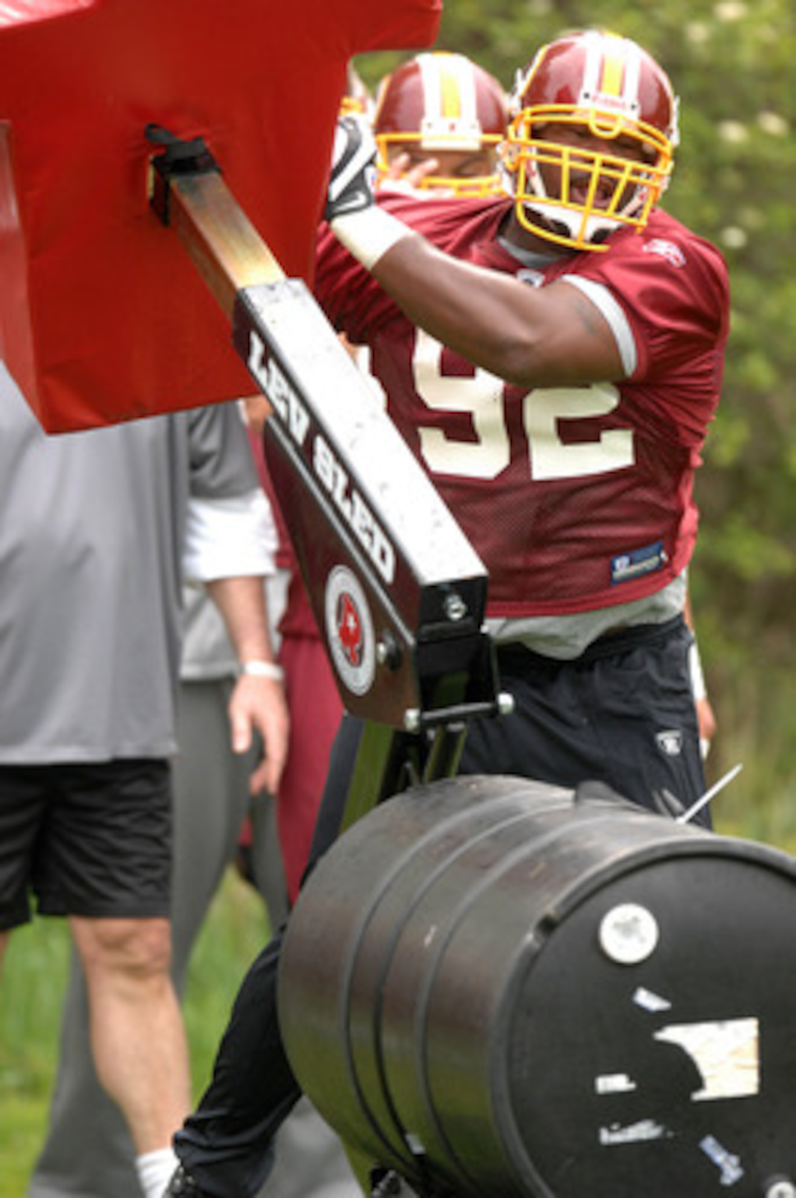 ASHBURN, VA - MAY 1:  Albert Haynesworth #92 of the Washington Redskins runs through drills during minicamp on May 1, 2009 at Redskins Park in Ashurn, Virginia.   (Photo by Mitchell Layton/Getty Images)