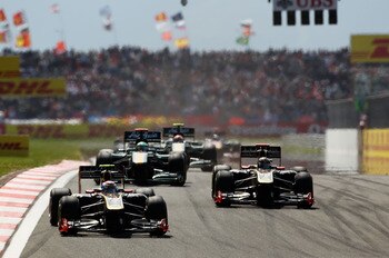 ISTANBUL, TURKEY - MAY 08:  Vitaly Petrov (left) of Russia and Renault and Nick Heidfeld (right) of Germany and Renault drive side by side during the Turkish Formula One Grand Prix at the Istanbul Park circuit on May 8, 2011 in Istanbul, Turkey.  (Photo b