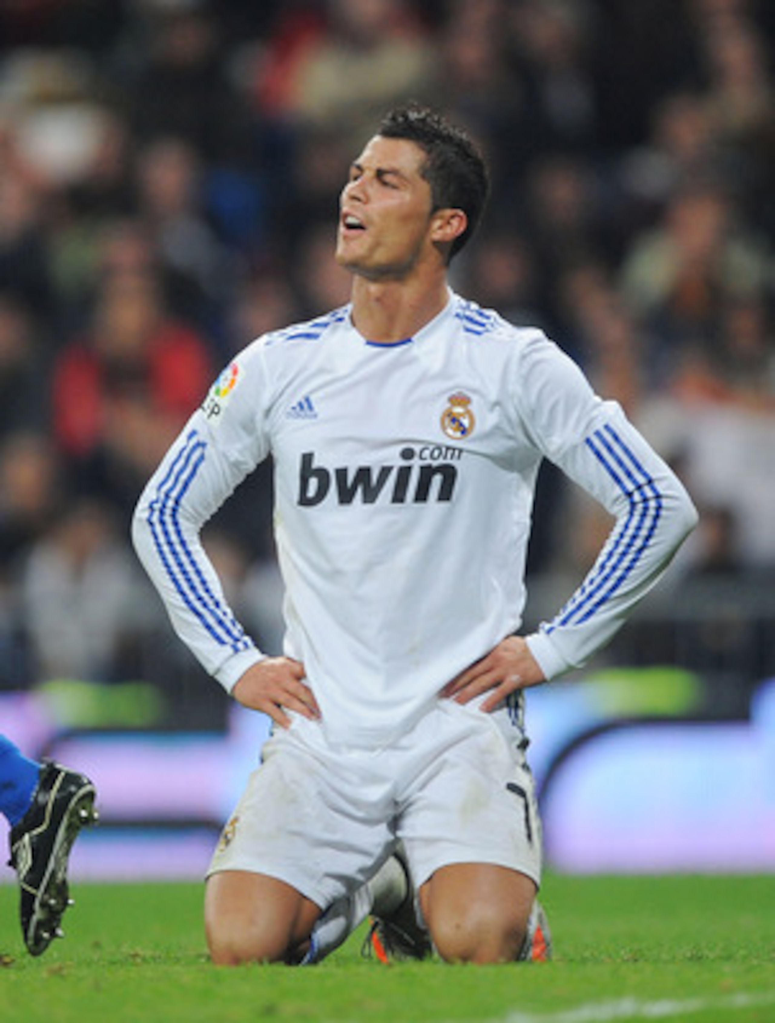 MADRID, SPAIN - JANUARY 13:  Cristiano Ronaldo of Real Madrid reacts during the Copa del Rey quarter final first leg match between Real Madrid and Atletico Madrid at Estadio Santiago Bernabeu on January 13, 2011 in Madrid, Spain.  (Photo by Denis Doyle/Ge