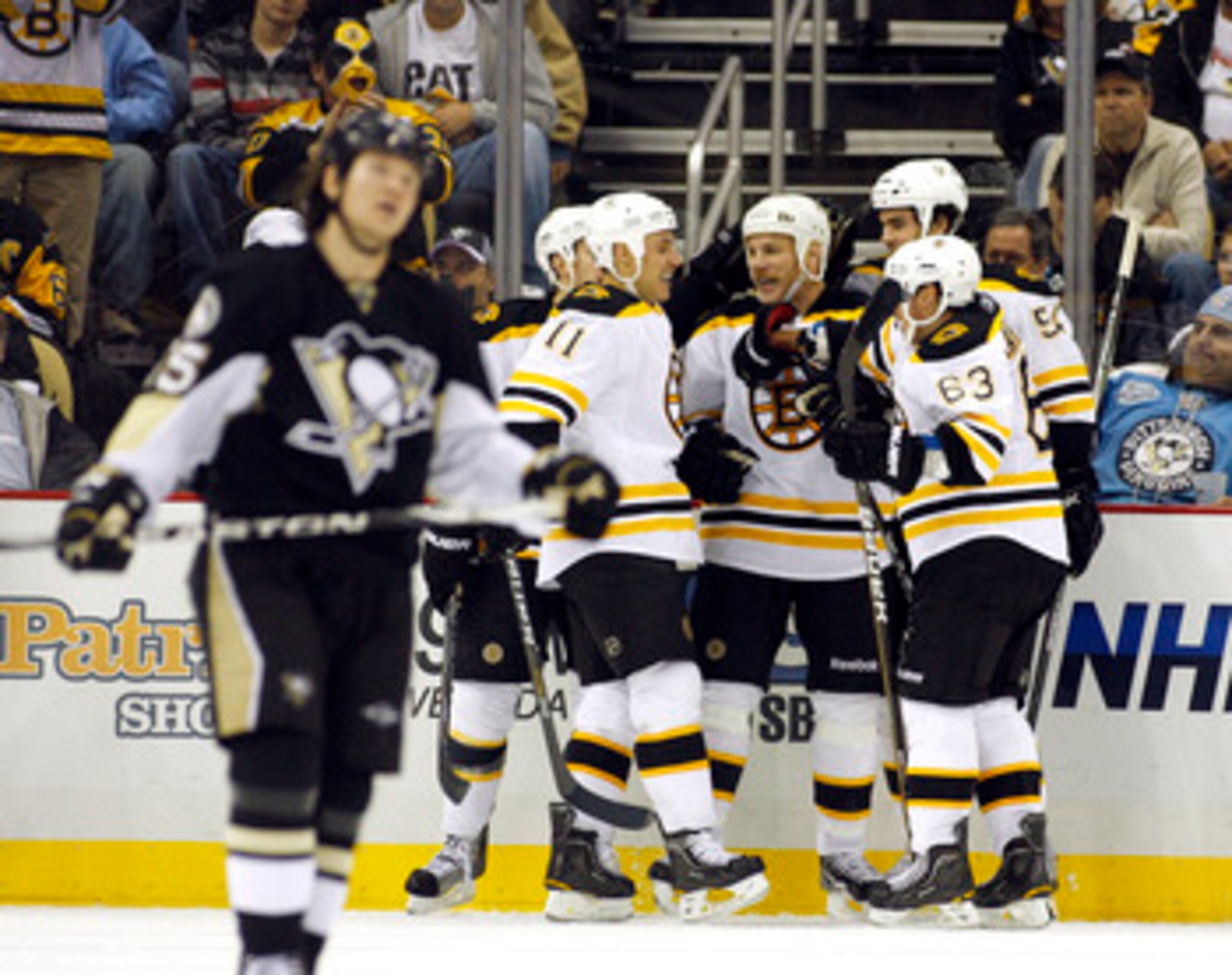 PITTSBURGH - NOVEMBER 10:  Shawn Thornton #22 of the Boston Bruins celebrates his third period goal with teammates against the Pittsburgh Penguins at Consol Energy Center on November 10, 2010 in Pittsburgh, Pennsylvania.  The Bruins defeated the Penguins 
