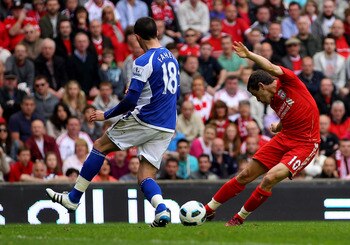 LIVERPOOL, ENGLAND - APRIL 23:  Joe Cole of Liverpool scores his team's fifth goal during the Barclays Premier League match between Liverpool and Birmingham City at Anfield on April 23, 2011 in Liverpool, England.  (Photo by Clive Brunskill/Getty Images)