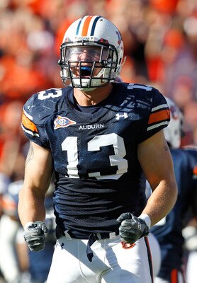 AUBURN - OCTOBER 16:  Auburn Tigers special teams player Craig Sanders #13 celebrates a tackle during the game against the Arkansas Razorbacks at Jordan-Hare Stadium on October 16, 2010 in Auburn, Alabama.  (Photo by Mike Zarrilli/Getty Images)