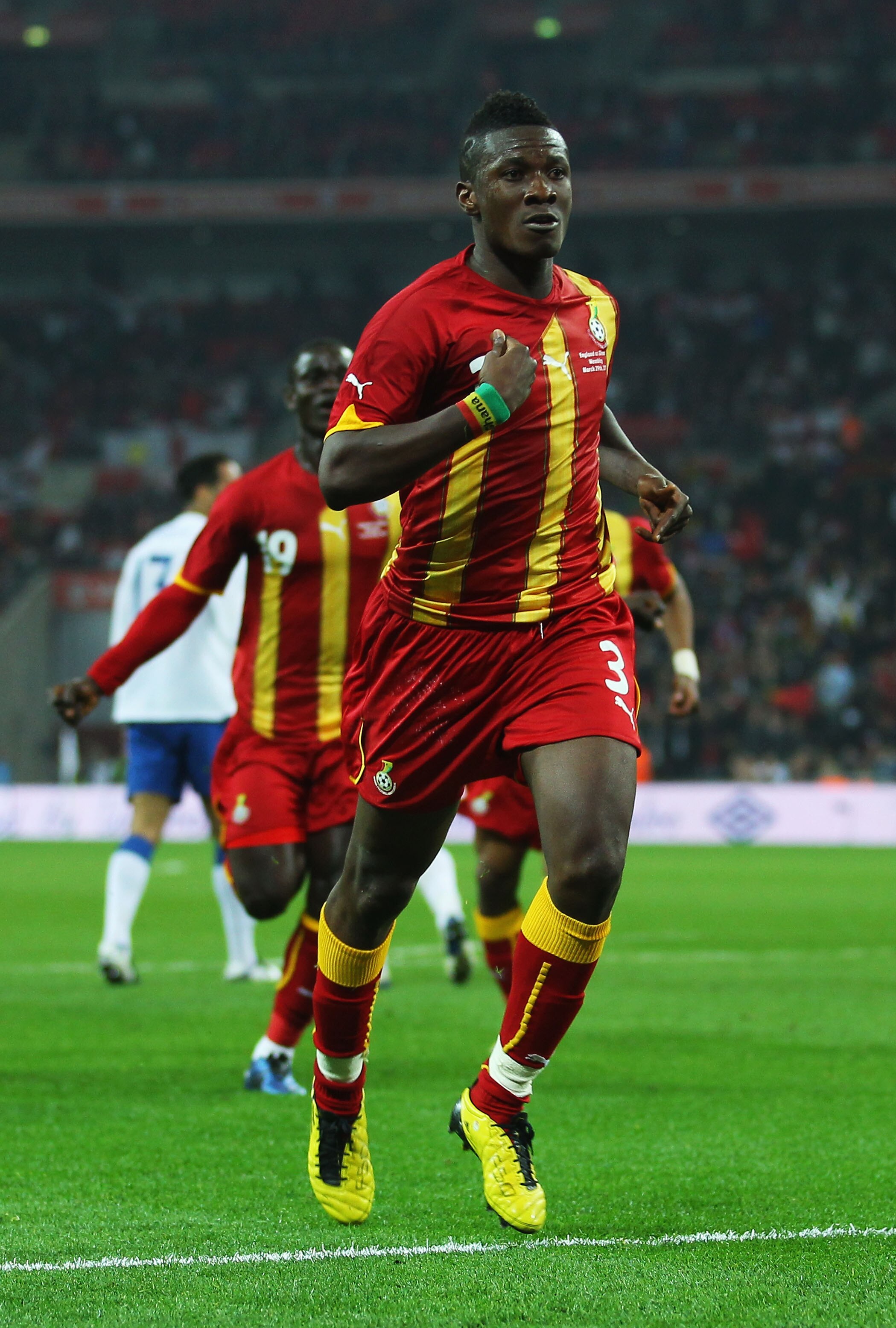 LONDON, ENGLAND - MARCH 29:  Asamoah Gyan of Ghana celebrates after he scores the equalising goal during the international friendly match between England and Ghana at Wembley Stadium on March 29, 2011 in London, England.  (Photo by Julian Finney/Getty Ima
