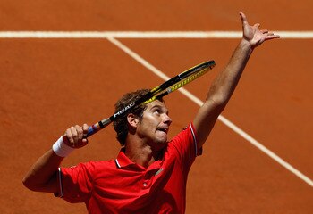 ROME, ITALY - MAY 14:  Richard Gasquet of France  serves during his semi final match against  Rafael Nadal of Spain during day seven of the Internazoinali BNL D'Italia at the Foro Italico Tennis Centre  on May 14, 2011 in Rome, Italy.  (Photo by Clive Bru