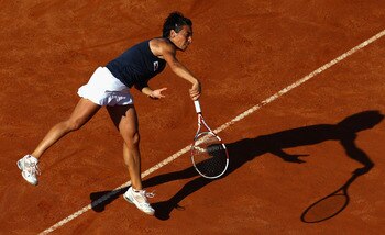 ROME, ITALY - MAY 13:  Francesca Schiavone of Italy serves during her quarter final match against Samantha Stosur of Australia  during day six of the Internazoinali BNL D'Italia at the Foro Italico Tennis Centre  on May 13, 2011 in Rome, Italy.  (Photo by