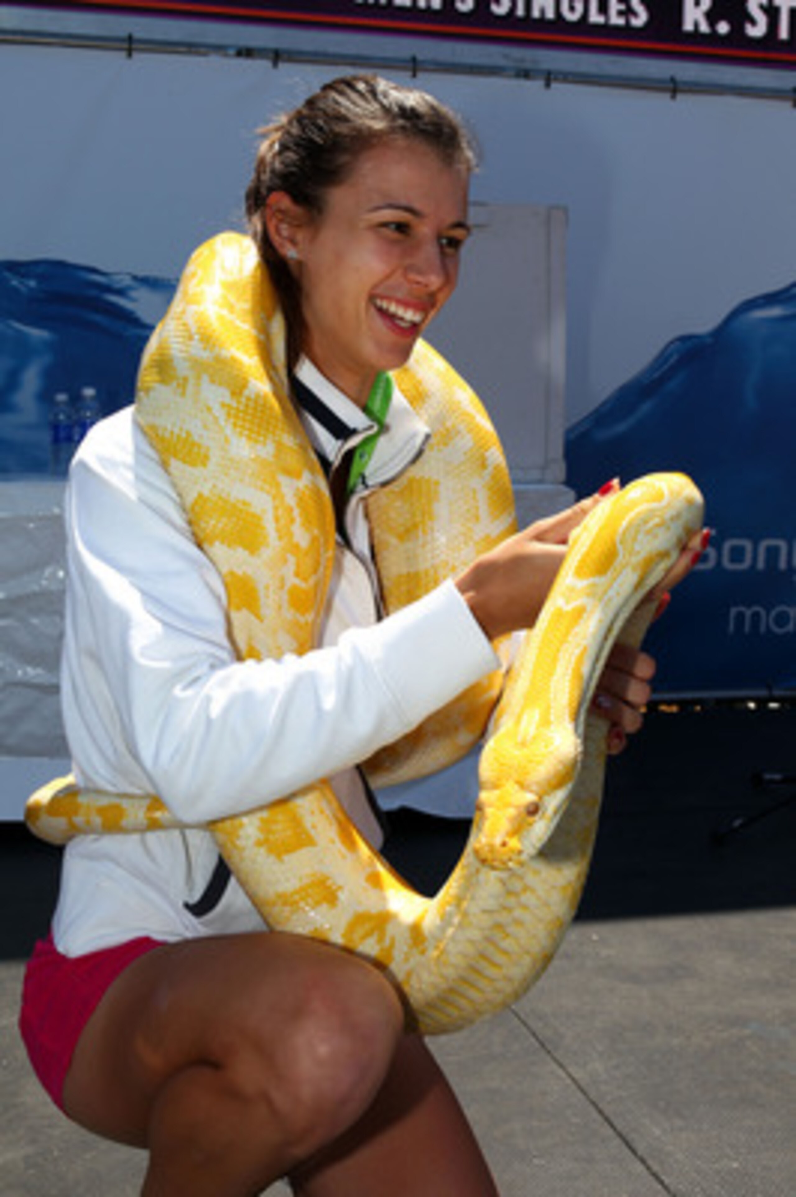 KEY BISCAYNE, FL - MARCH 24: Tzvetana Pironkova of Bulgaria holds a snake from the Miami Metro Zoo during the Sony Ericsson Open at Crandon Park Tennis Center on March 24, 2011 in Key Biscayne, Florida. (Photo by Clive Brunskill/Getty Images) KEY BISCAYNE, FL - MARCH 24: Tzvetana Pironkova of Bulgaria holds a snake from the Miami Metro Zoo during the Sony Ericsson Open at Crandon Park Tennis Center on March 24, 2011 in Key Biscayne, Florida. (Photo by Clive Brunskill/Getty Images)