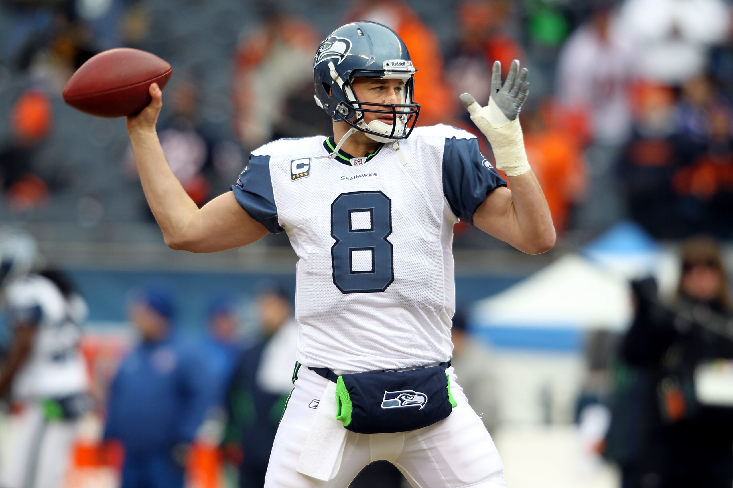 CHICAGO, IL - JANUARY 16:  Quarterback Matt Hasselbeck #8 of the Seattle Seahawks looks to throw the ball during pregame before taking on the Chicago Bears in the 2011 NFC divisional playoff game at Soldier Field on January 16, 2011 in Chicago, Illinois. 