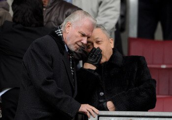 WIGAN, ENGLAND - MAY 15: West Ham United Joint Chairmen David Sullivan and David Gold (L) chat prior to the Barclays Premier League match between Wigan Athletic and West Ham United at the DW Stadium on May 15, 2011 in Wigan, England. (Photo by Chris Bruns