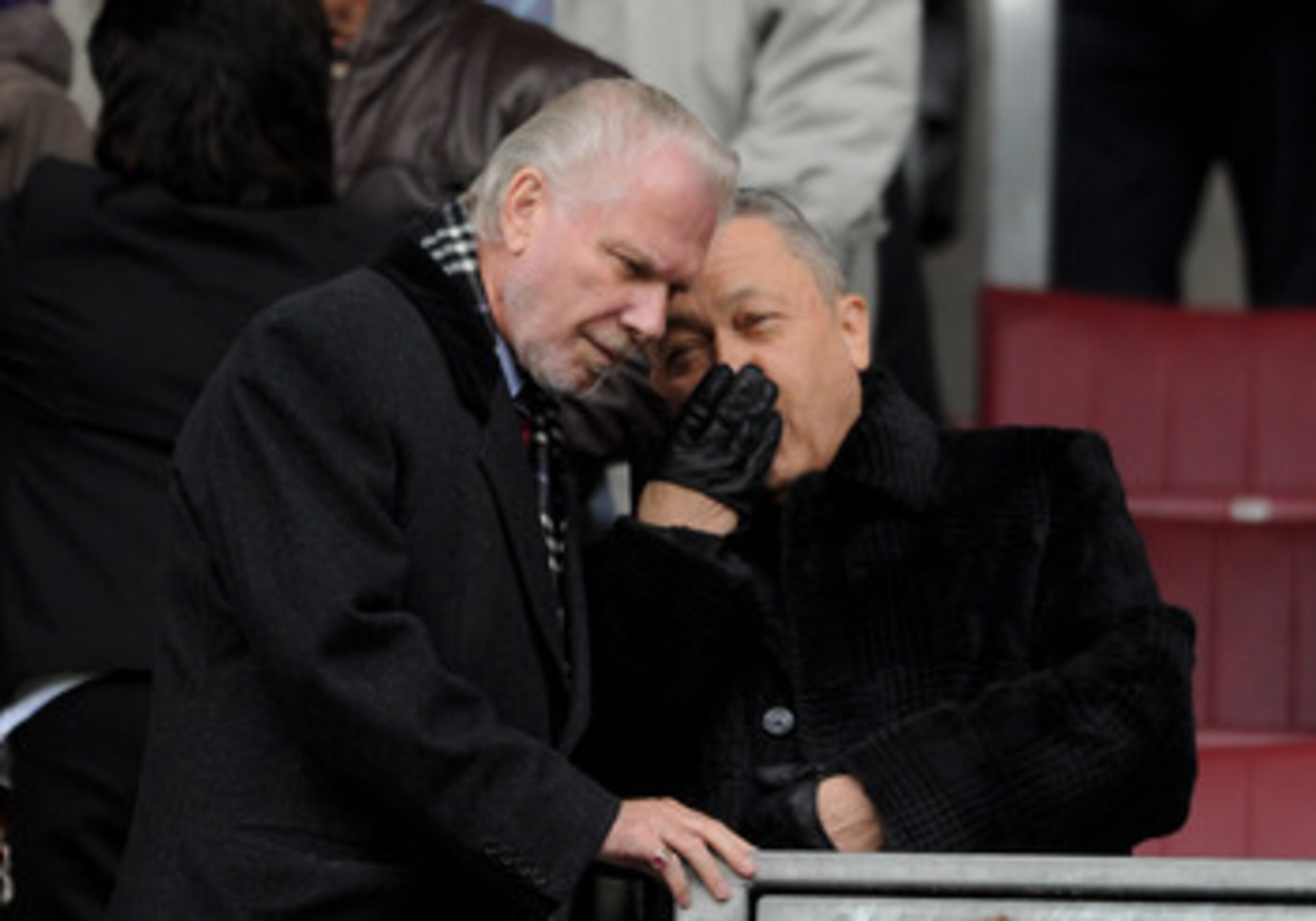 WIGAN, ENGLAND - MAY 15: West Ham United Joint Chairmen David Sullivan and David Gold (L) chat prior to the Barclays Premier League match between Wigan Athletic and West Ham United at the DW Stadium on May 15, 2011 in Wigan, England. (Photo by Chris Bruns