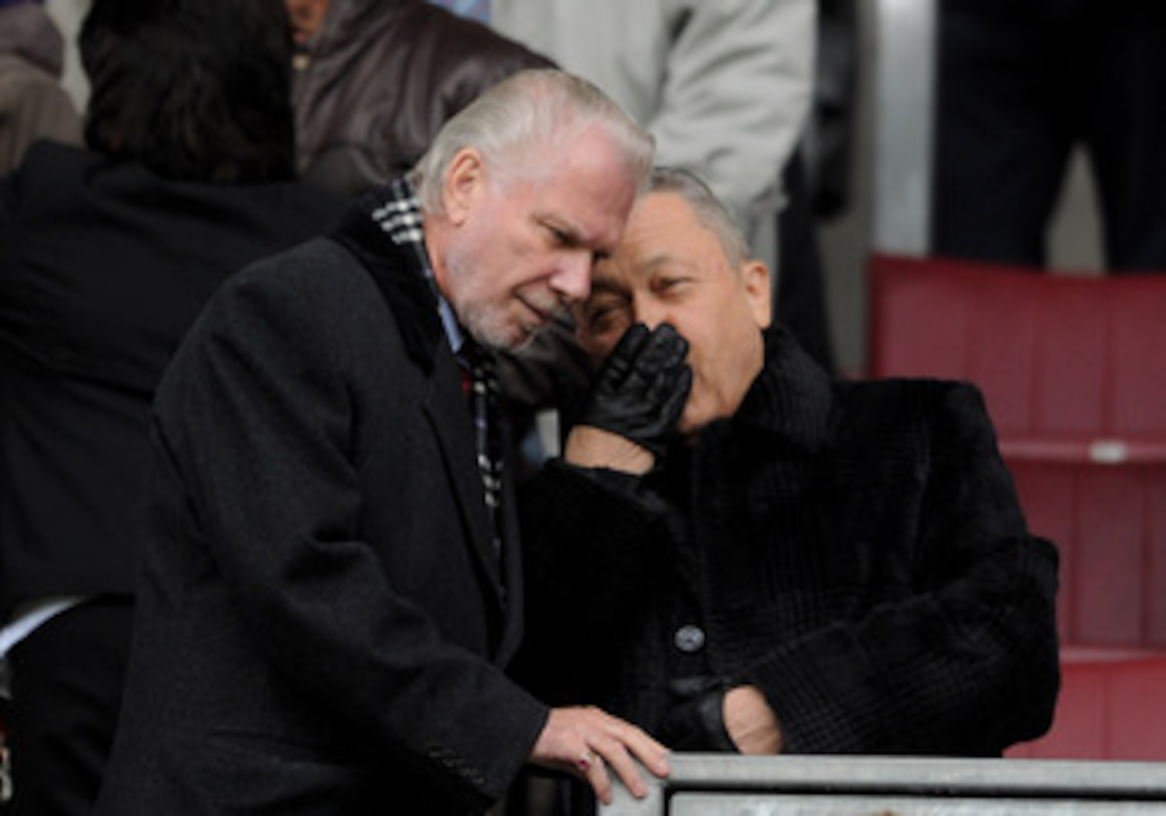 WIGAN, ENGLAND - MAY 15: West Ham United Joint Chairmen David Sullivan and David Gold (L) chat prior to the Barclays Premier League match between Wigan Athletic and West Ham United at the DW Stadium on May 15, 2011 in Wigan, England. (Photo by Chris Bruns