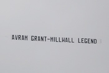 WIGAN, ENGLAND - MAY 15: An aircraft tows a banner above the stadium mocking West Ham Manager Avram Grant during the Barclays Premier League match between Wigan Athletic and West Ham United at the DW Stadium on May 15, 2011 in Wigan, England. (Photo by Ch